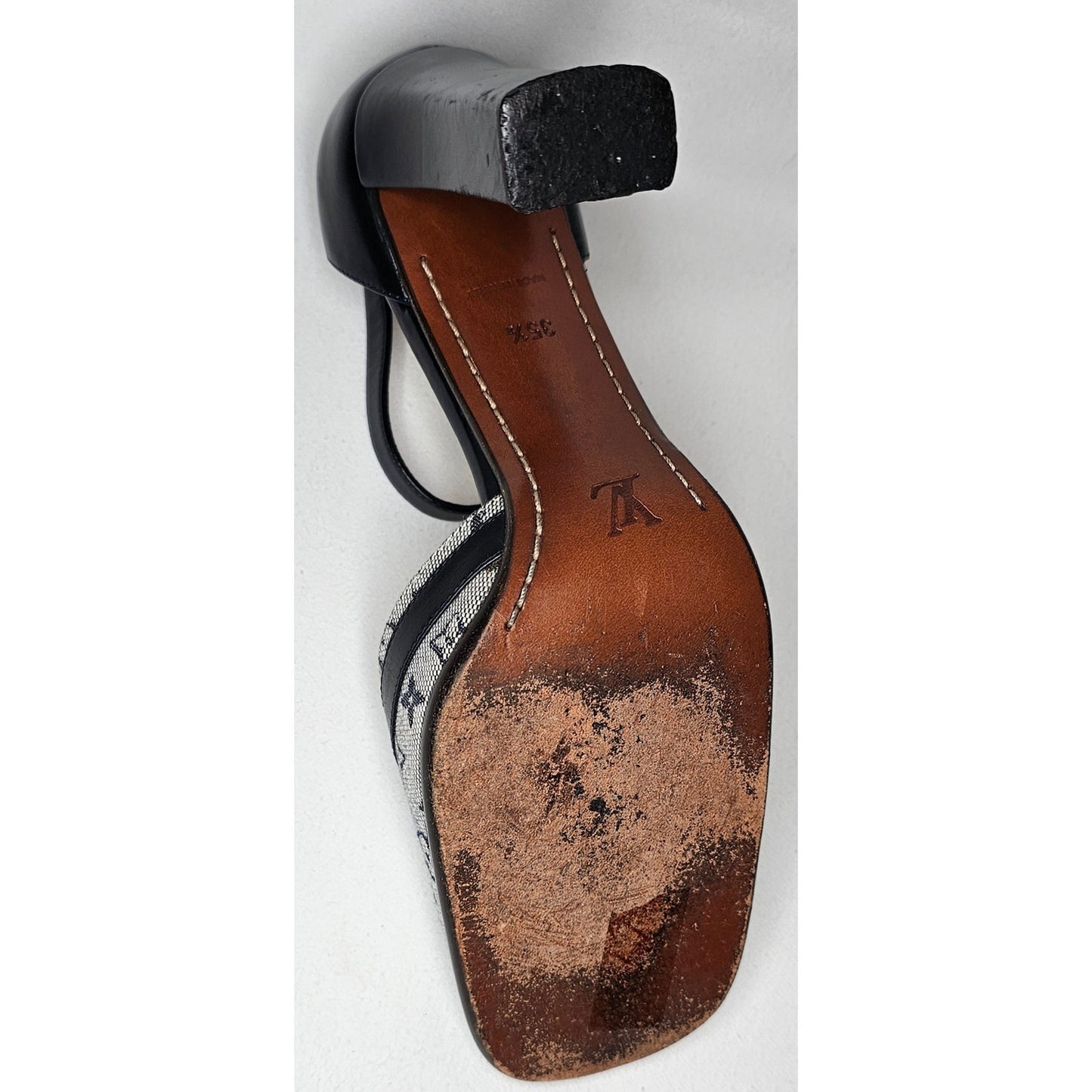 Louis Vuitton D'Orsay ankle strap pumps in blue monogram mini lin canvas and black leather.