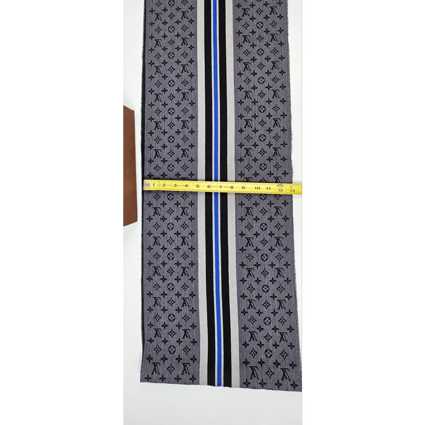 Louis Vuitton Wool Scarf in black with a stripe design