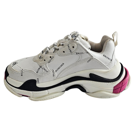 Balenciaga Triple S sneakers in white and black with pink accents and all-over logo detailing