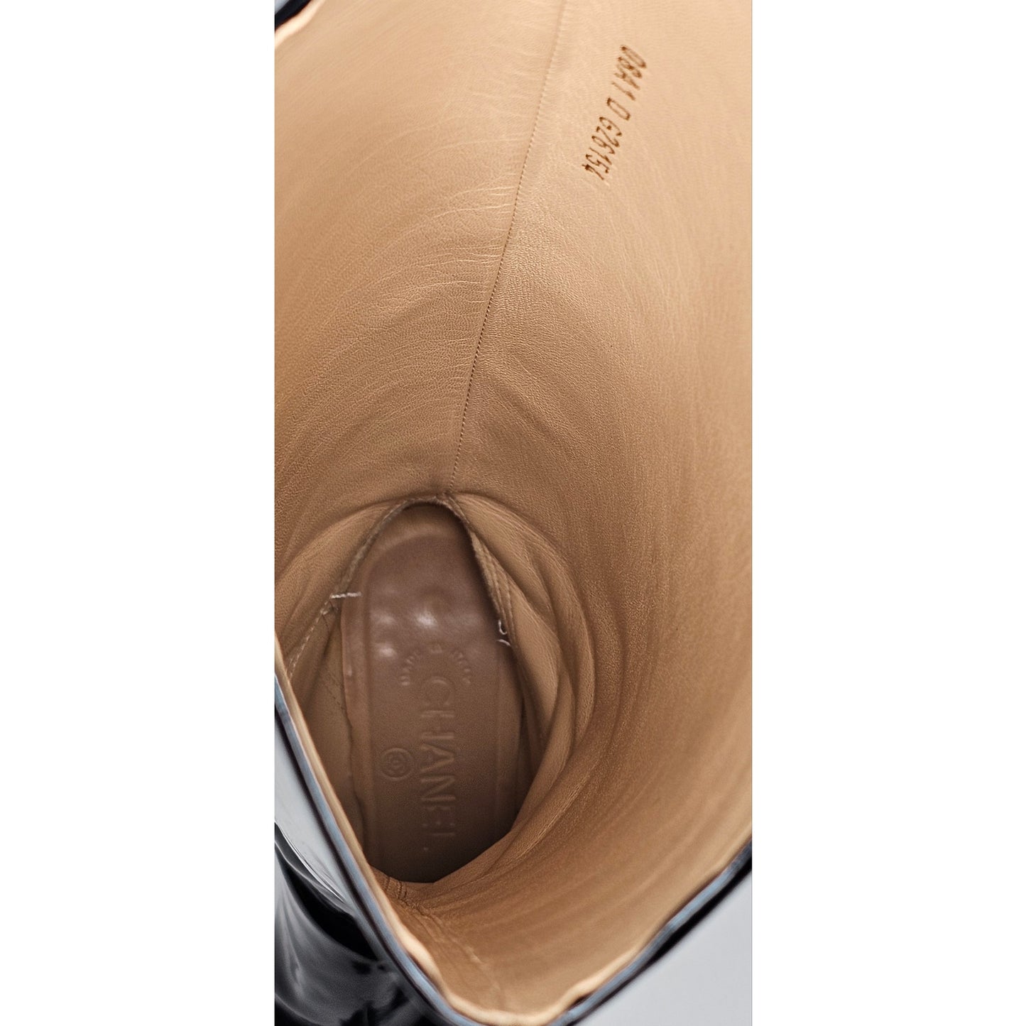 Chanel black patent leather boots with a chunky heel and embroidered CC logo