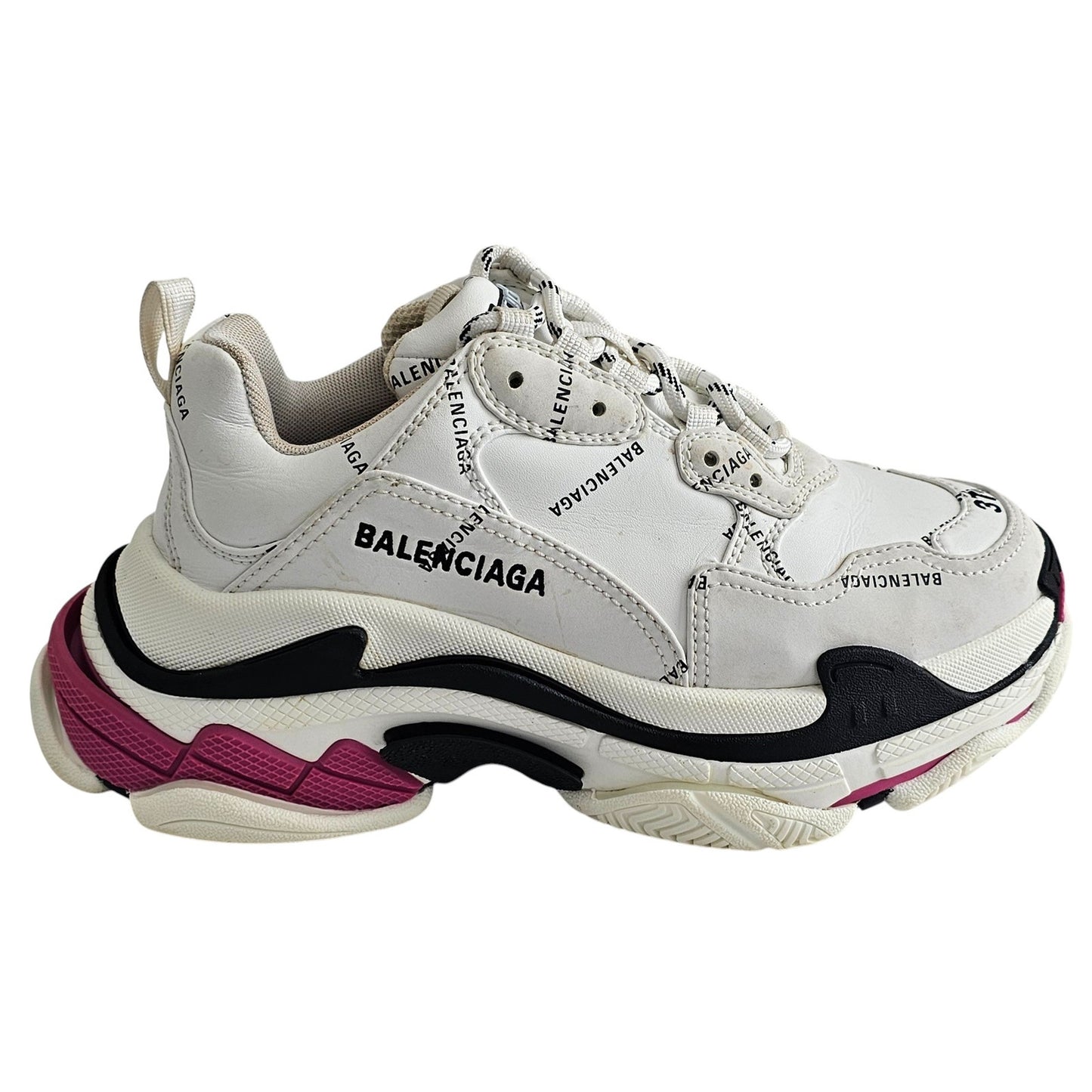 Balenciaga Triple S sneakers in white and black with pink accents and all-over logo detailing