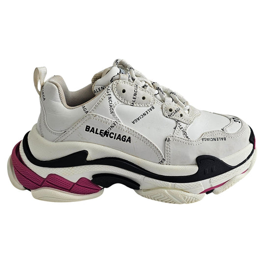 Balenciaga Triple S sneakers in white and black with pink accents and all-over logo detailing