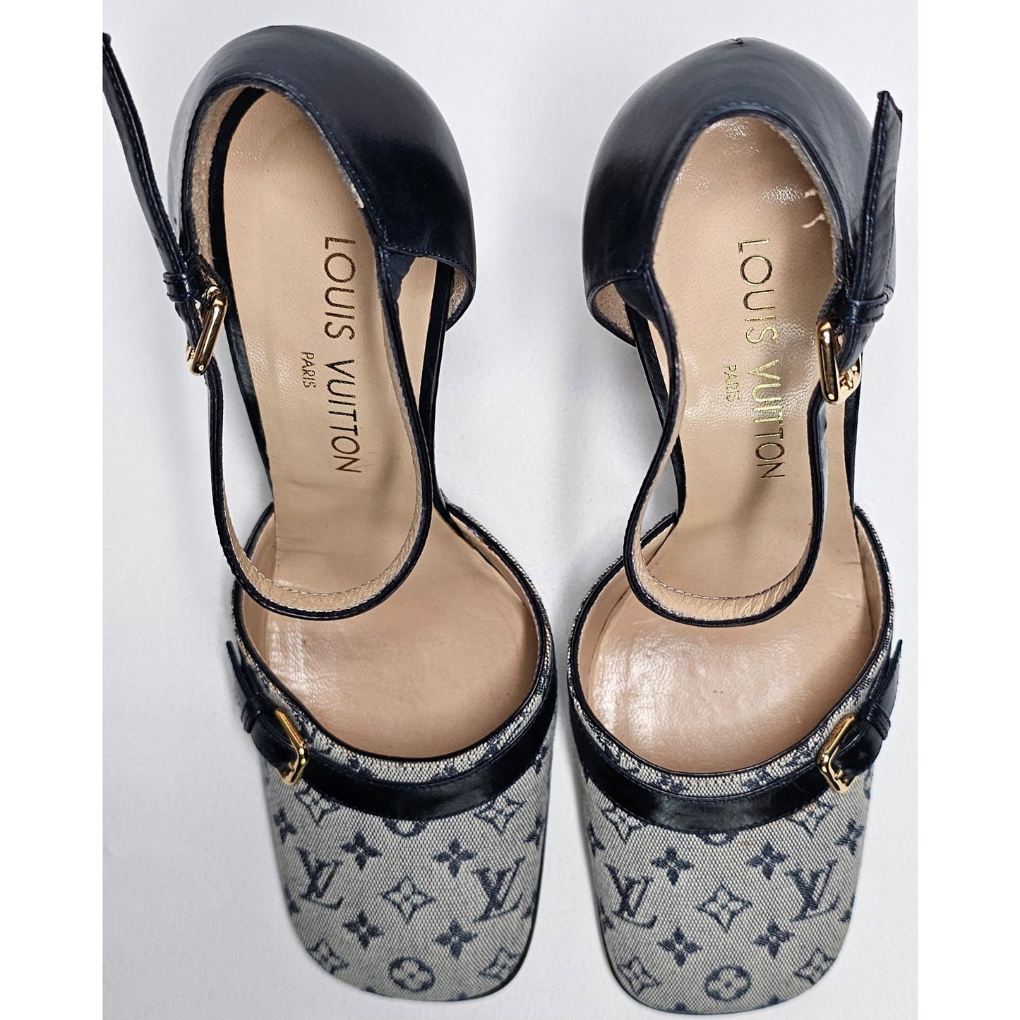 Louis Vuitton D'Orsay ankle strap pumps in blue monogram mini lin canvas and black leather.
