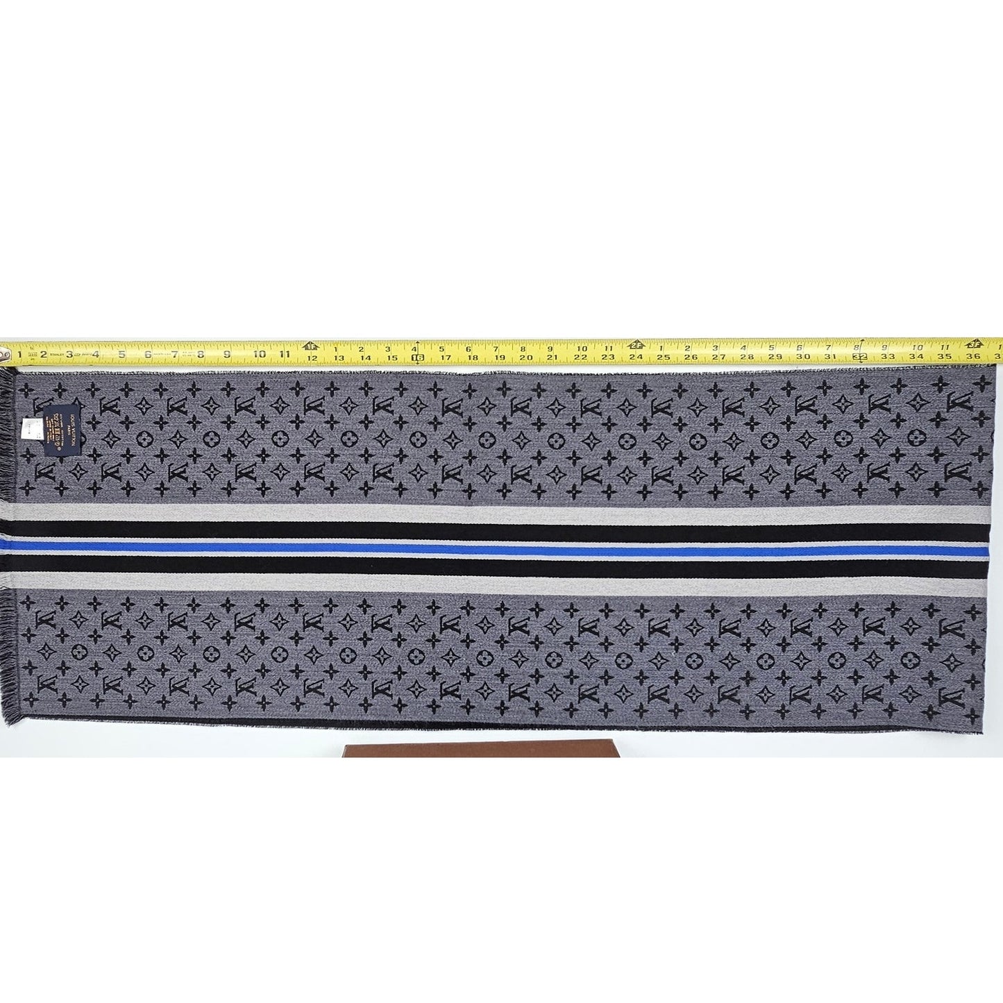 Louis Vuitton Wool Scarf in black with a stripe design