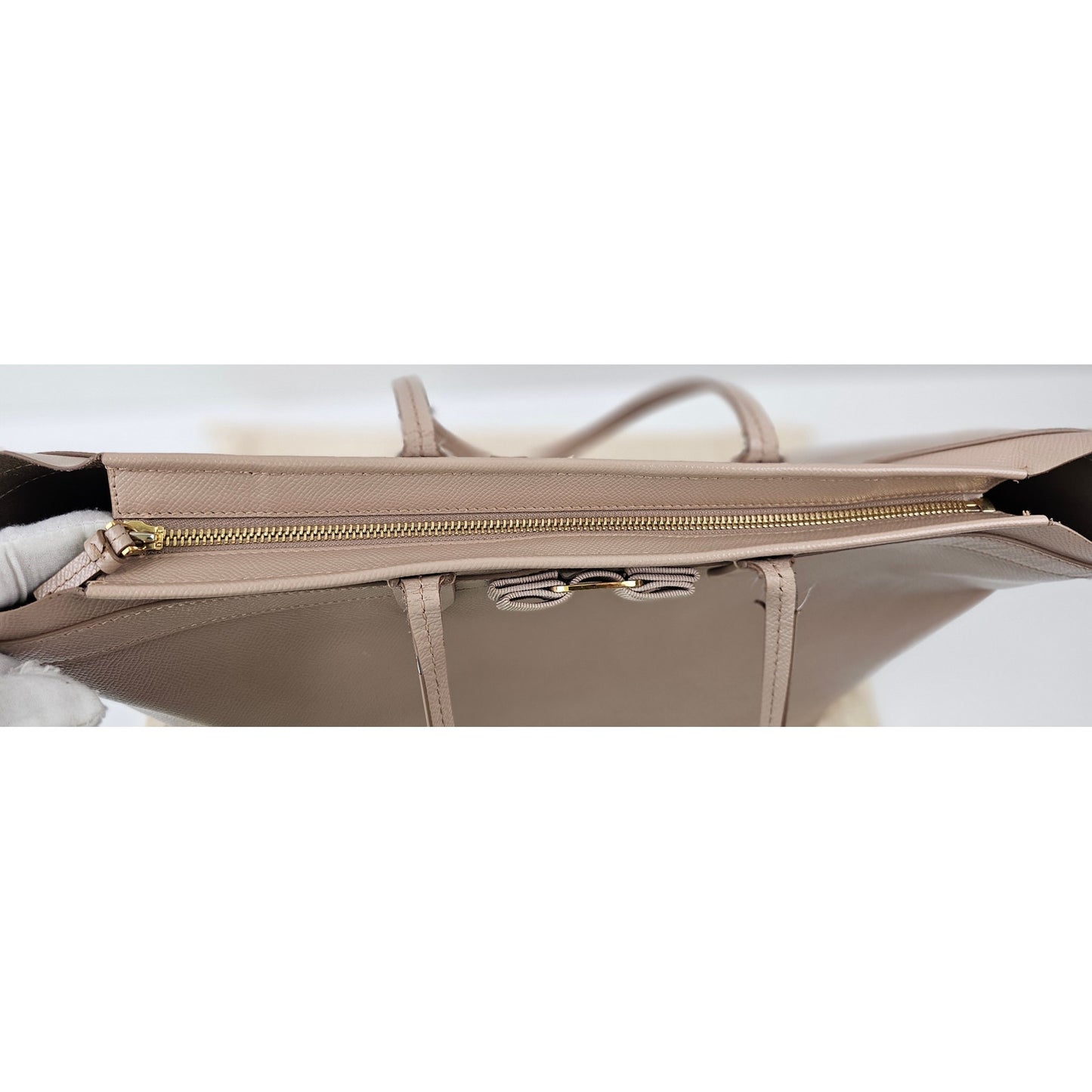 Salvatore Ferragamo Vara Bow smooth leather tote bag in a pink beige color