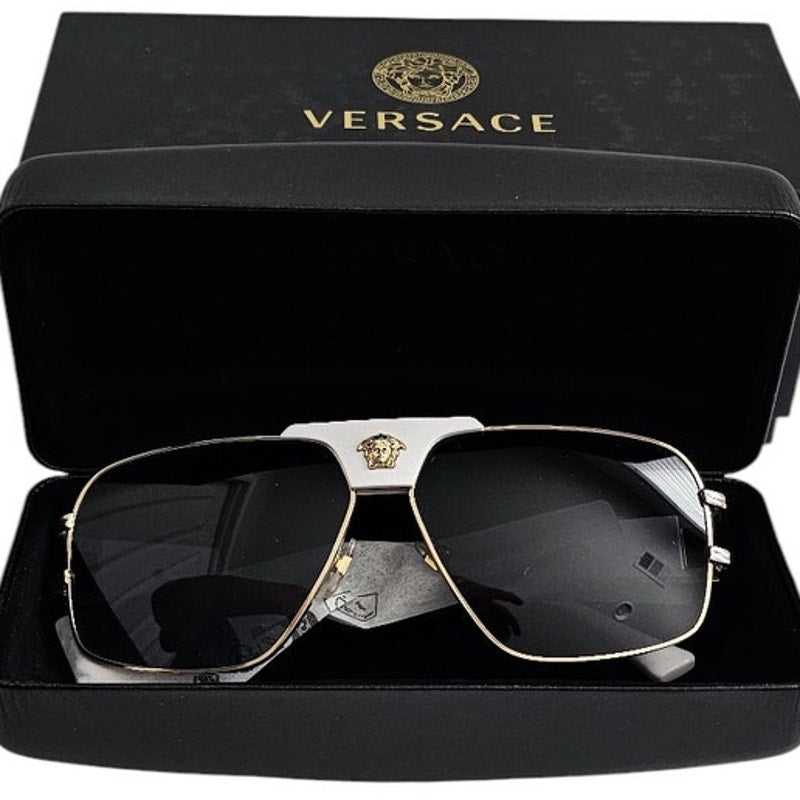 Versace men's VE2251 navigator/pilot sunglasses in a gold-tone steel frame with a white brow bar and dark grey lenses