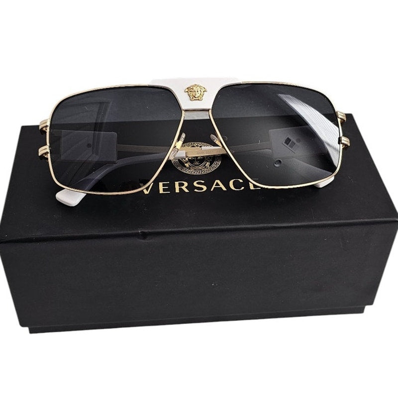 Versace men's VE2251 navigator/pilot sunglasses in a gold-tone steel frame with a white brow bar and dark grey lenses