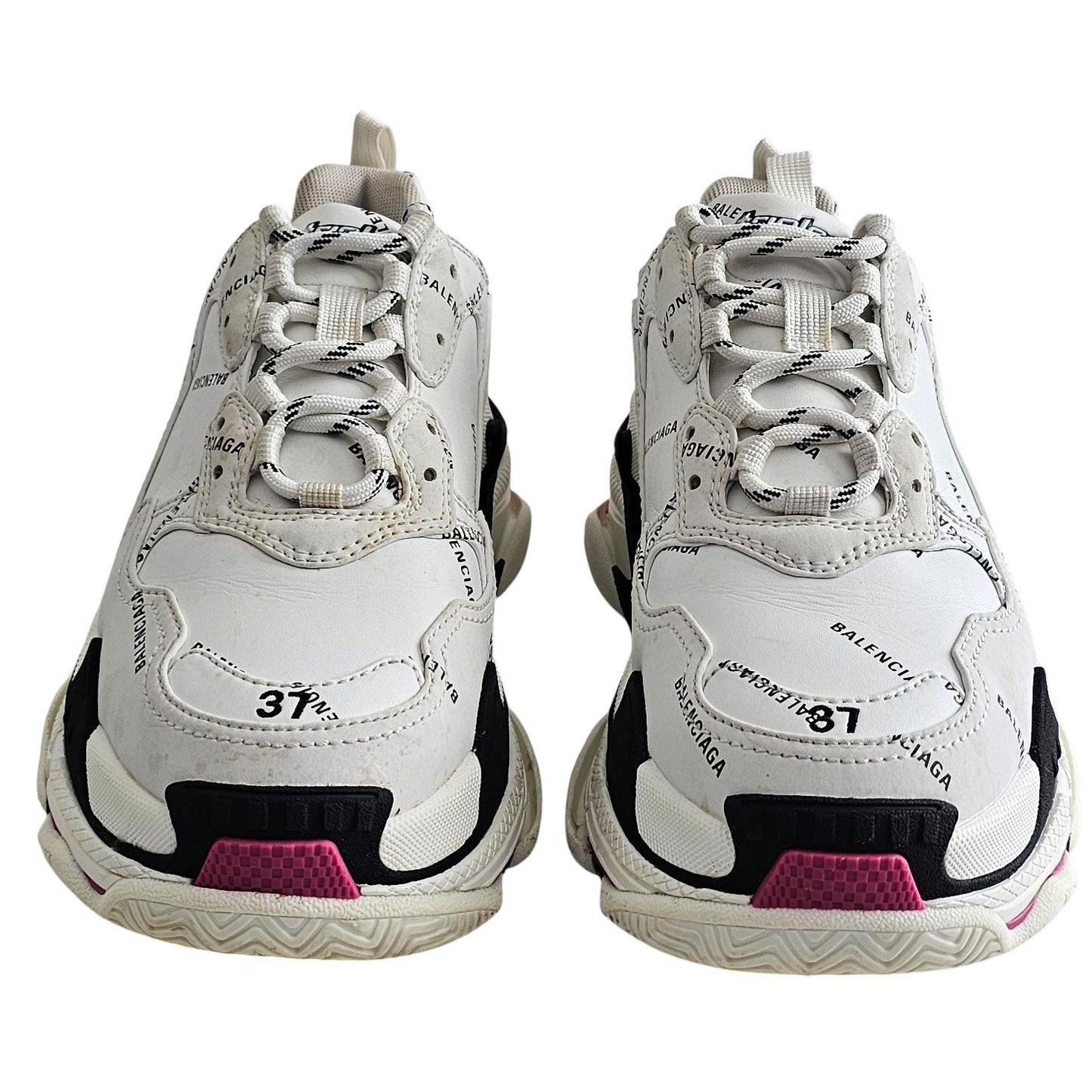Balenciaga Triple S sneakers in white and black with pink accents and all-over logo detailing