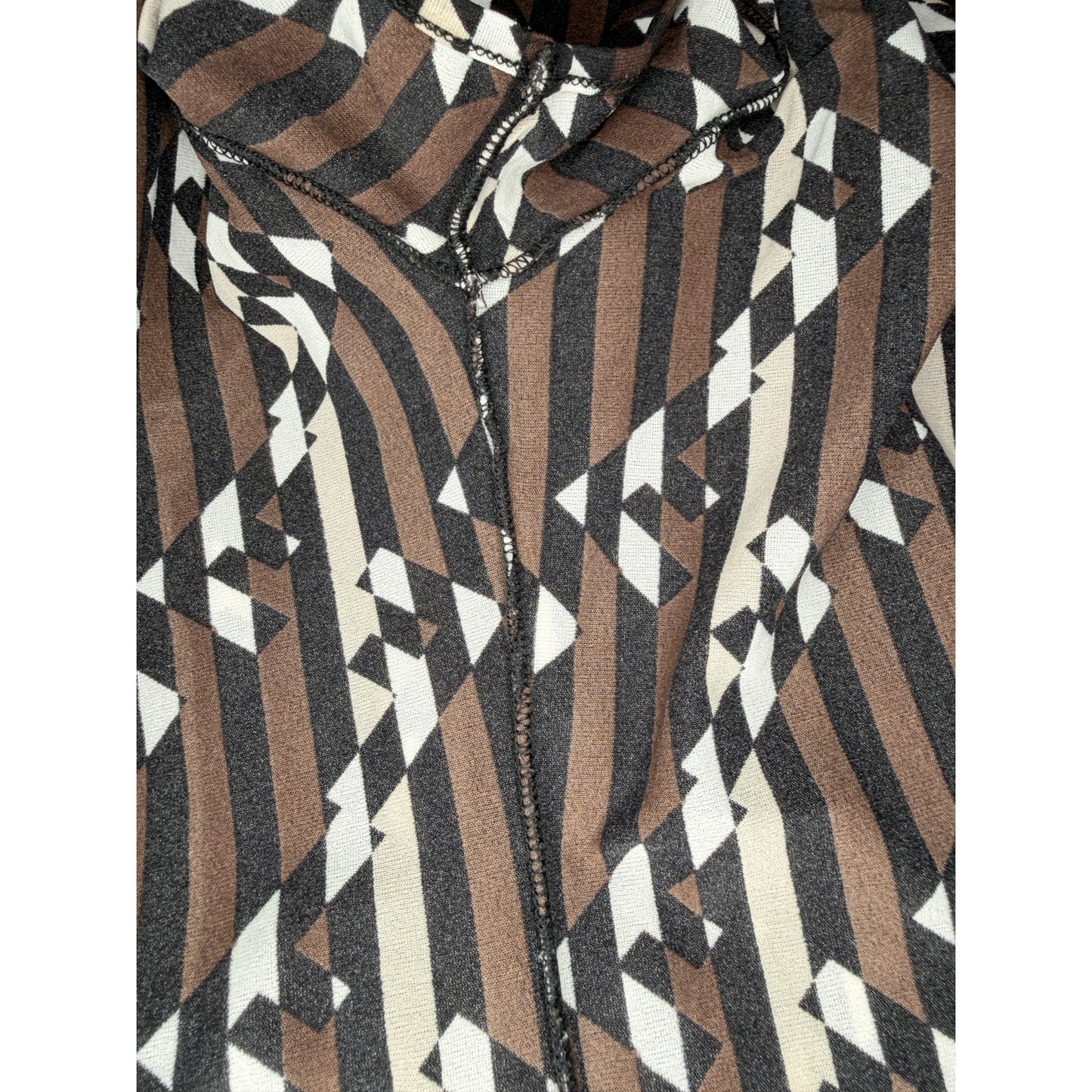 Fendi vintage 1990s T-shirt features a vertical Zucca FF logo pattern in brown, black, and white