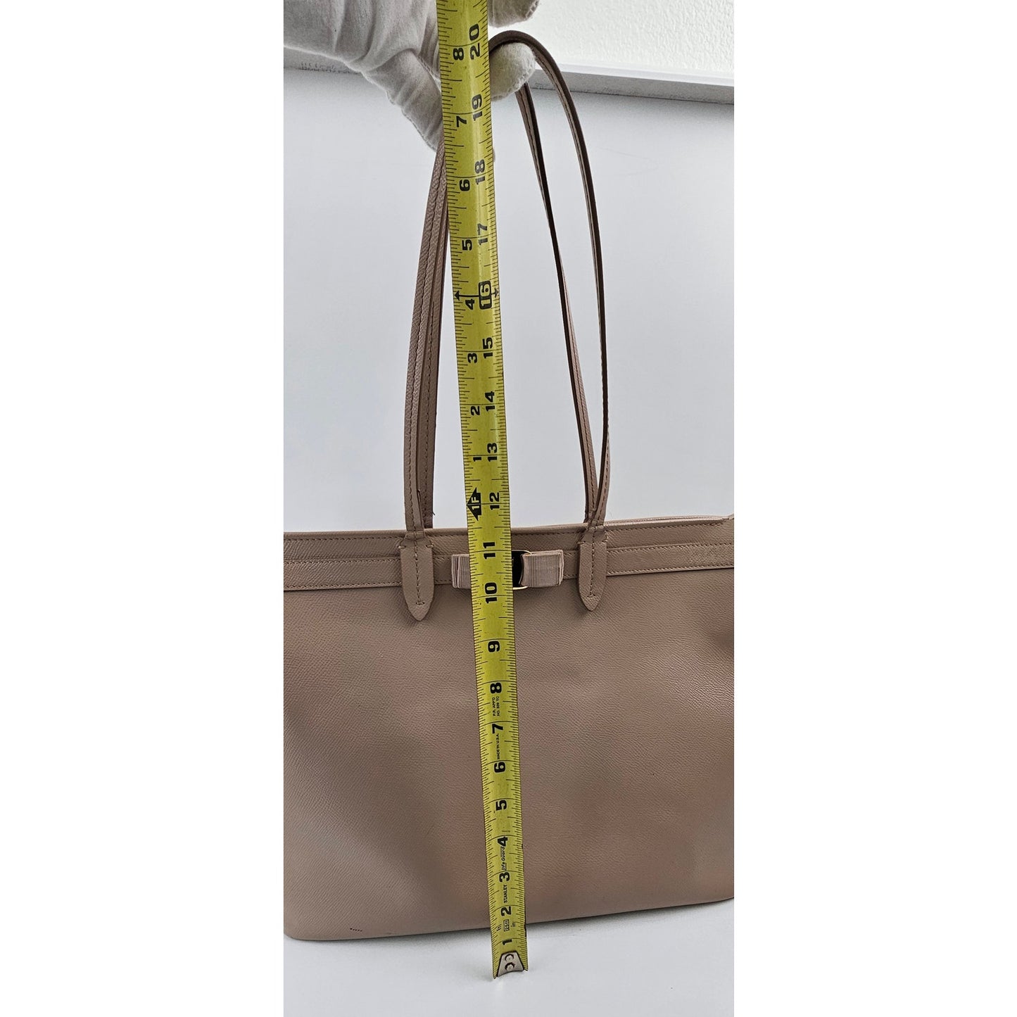 Salvatore Ferragamo Vara Bow smooth leather tote bag in a pink beige color