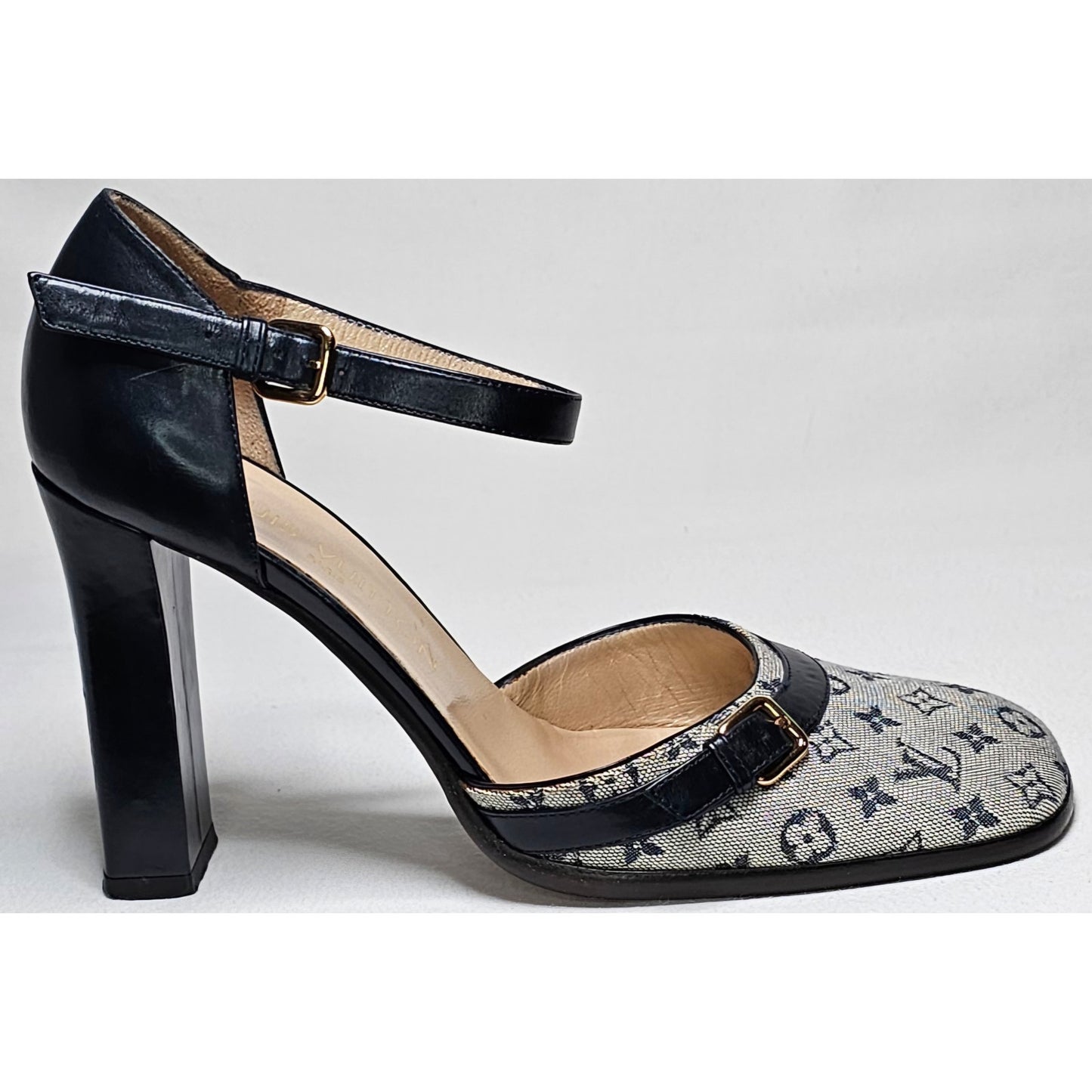 Louis Vuitton D'Orsay ankle strap pumps in blue monogram mini lin canvas and black leather.
