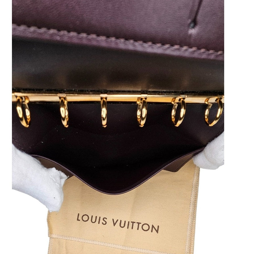 Louis Vuitton Monogram Vernis Agenda PM day planner cover in the color Amarante