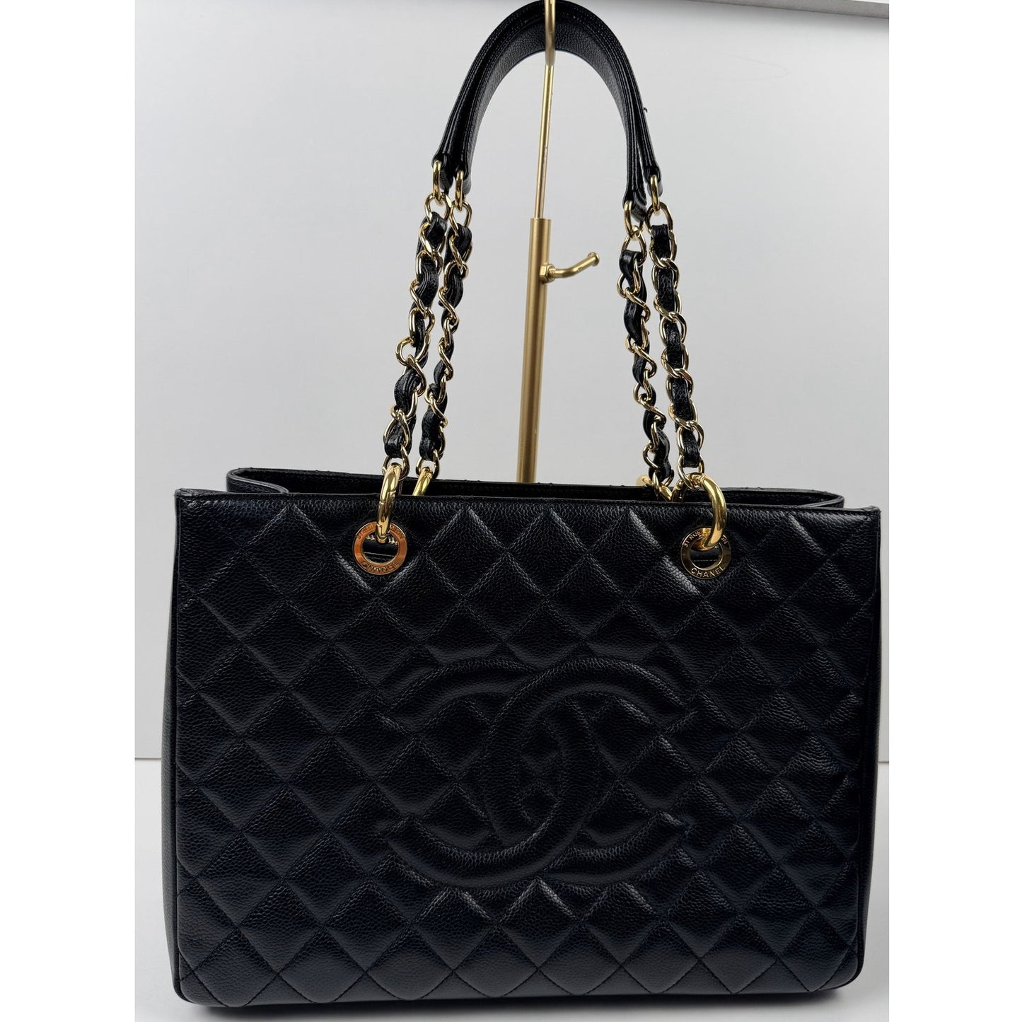 Chanel Grand Shopping Tote (GST) bag in black caviar leather with gold-tone hardware