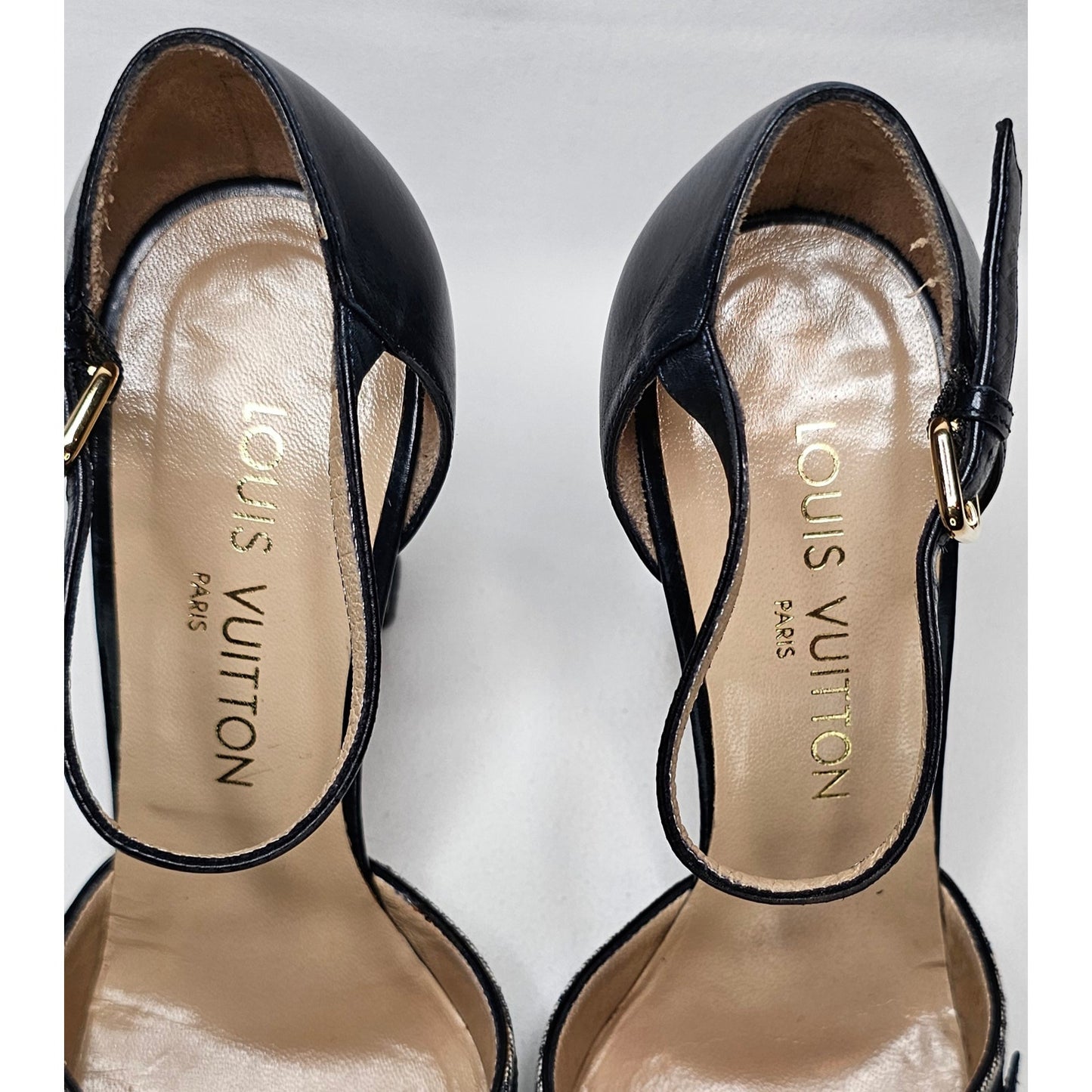 Louis Vuitton D'Orsay ankle strap pumps in blue monogram mini lin canvas and black leather.