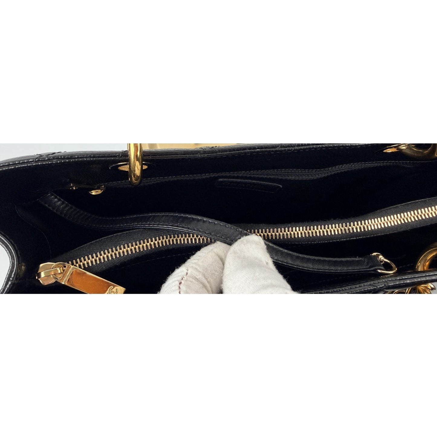 Chanel Grand Shopping Tote (GST) bag in black caviar leather with gold-tone hardware