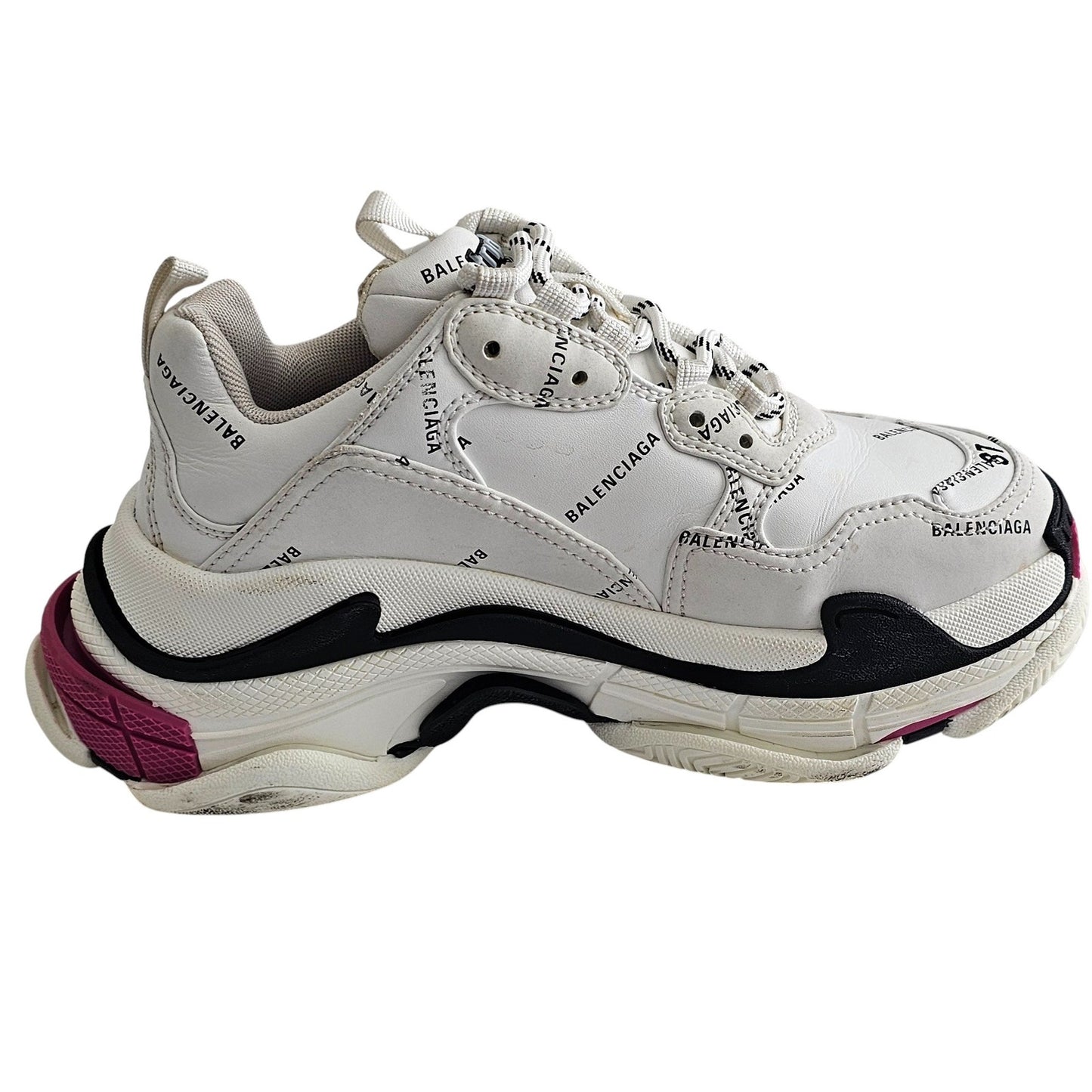 Balenciaga Triple S sneakers in white and black with pink accents and all-over logo detailing