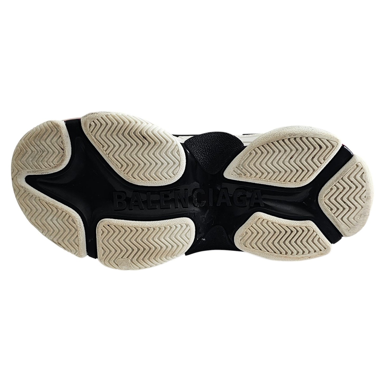 Balenciaga Triple S sneakers in white and black with pink accents and all-over logo detailing