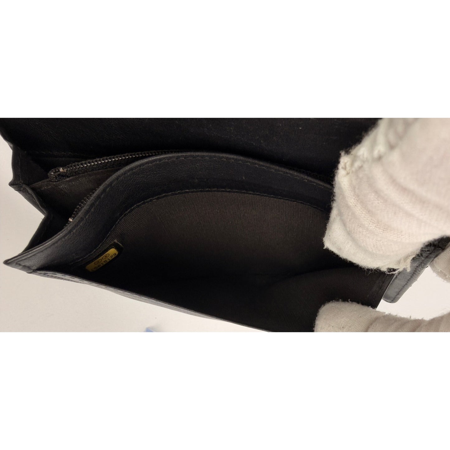 Chanel quilted patent leather long bifold wallet with a polished CC logo