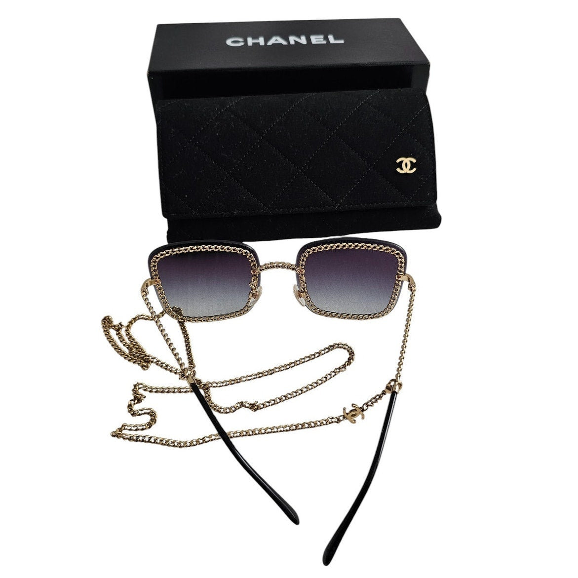 Chanel CH4244 square metal frame sunglasses with a detachable gold-tone chain and grey gradient lenses