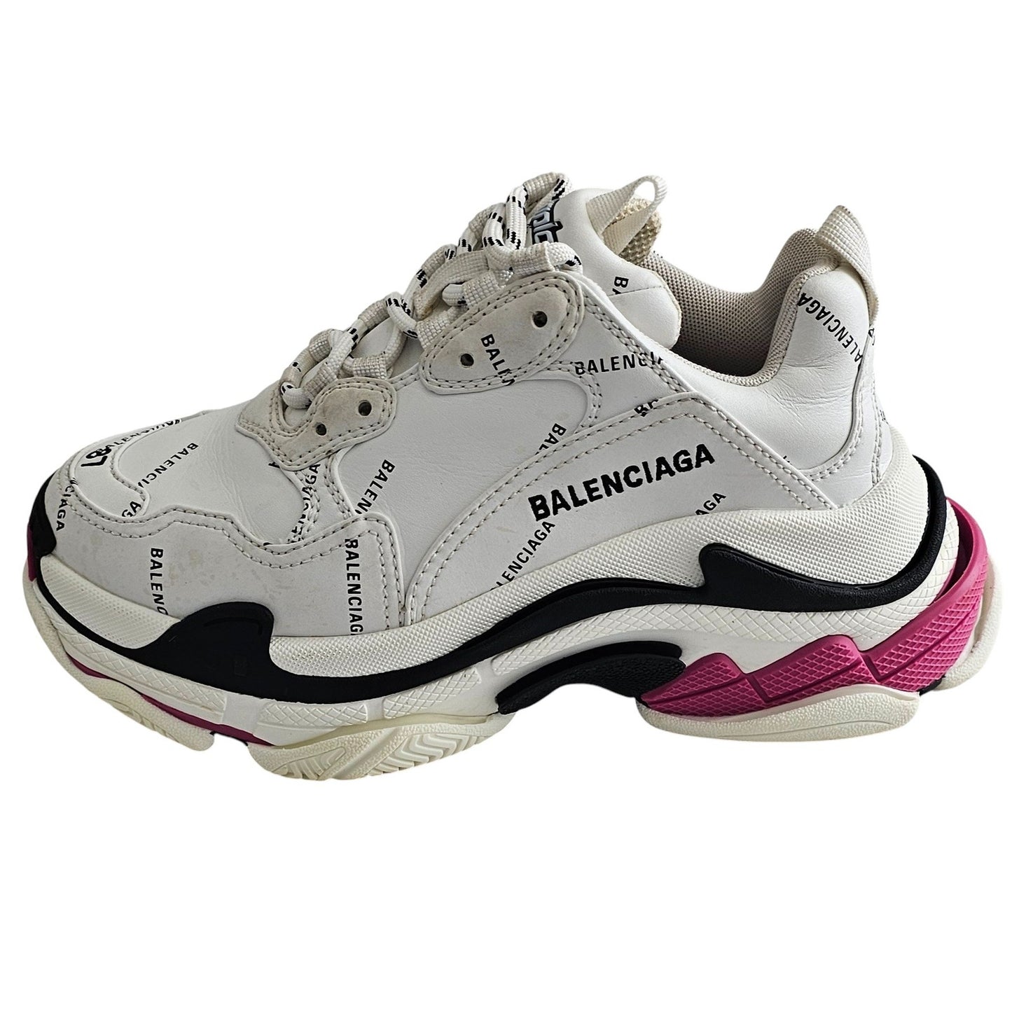 Balenciaga Triple S sneakers in white and black with pink accents and all-over logo detailing