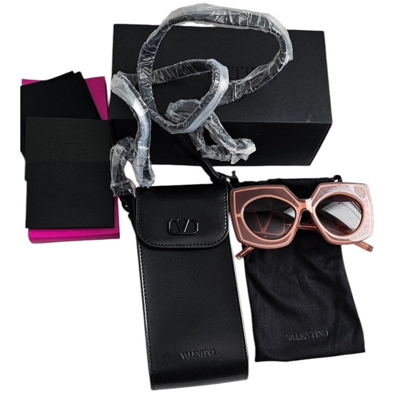 Valentino Garavani V-Soul butterfly sunglasses in powder pink Japanese acetate with gradient lenses and rose gold titanium details