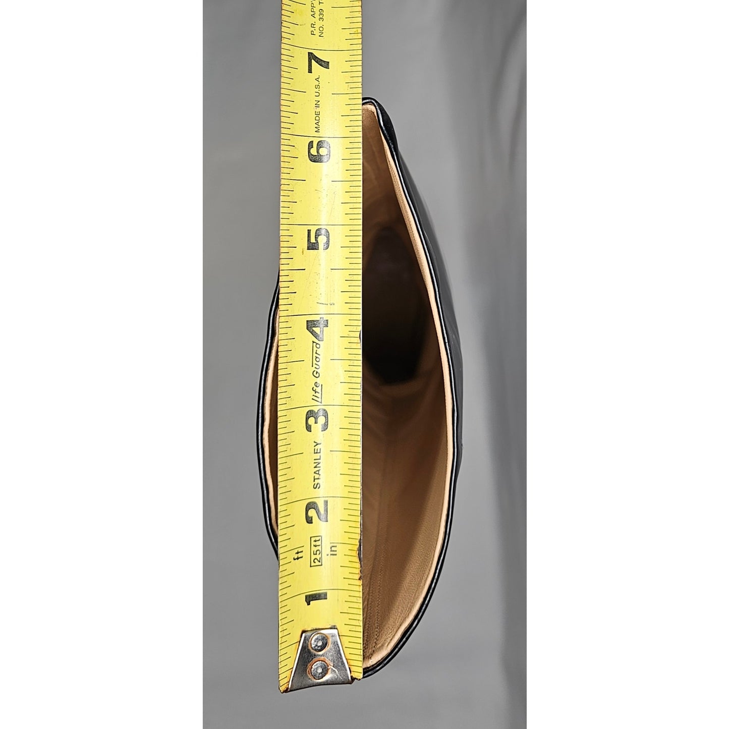 Chanel black patent leather boots with a chunky heel and embroidered CC logo