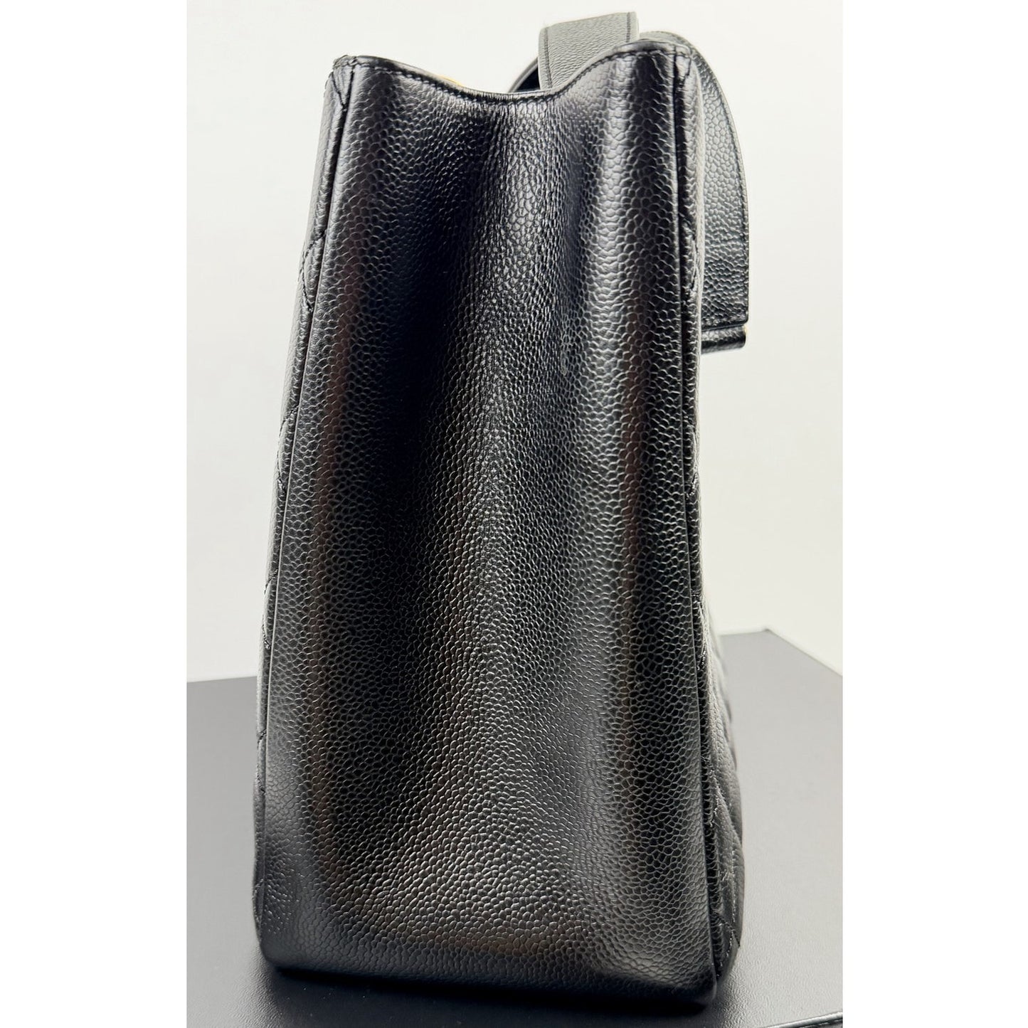 Chanel Grand Shopping Tote (GST) bag in black caviar leather with gold-tone hardware
