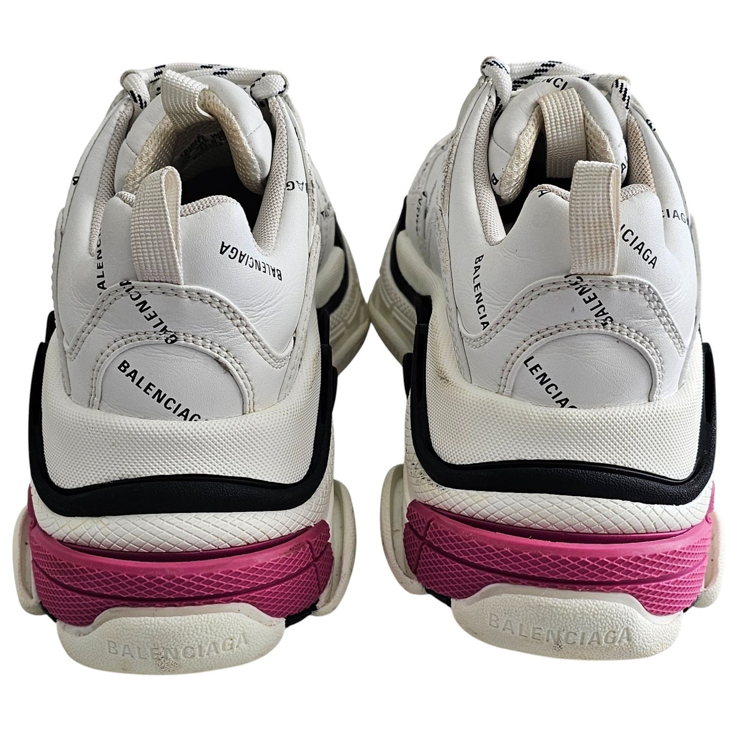 Balenciaga Triple S sneakers in white and black with pink accents and all-over logo detailing