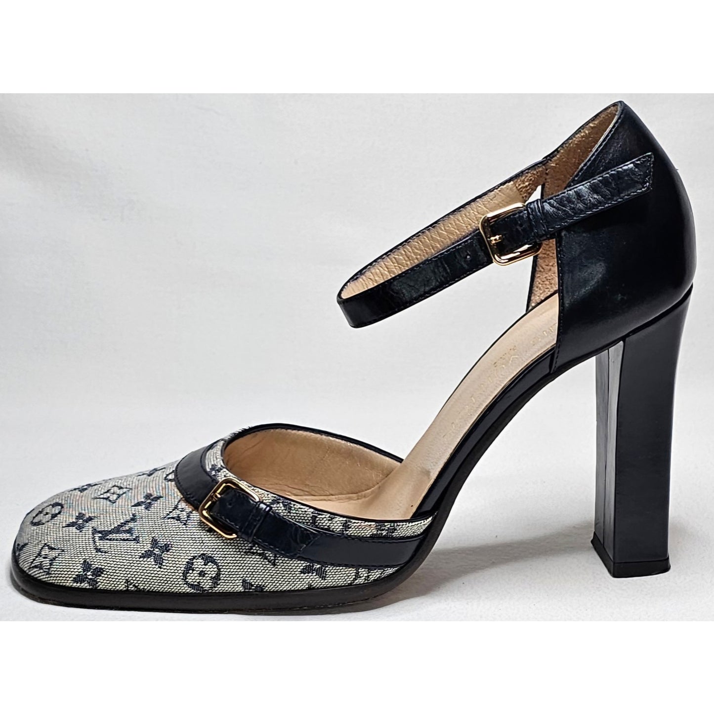 Louis Vuitton D'Orsay ankle strap pumps in blue monogram mini lin canvas and black leather.