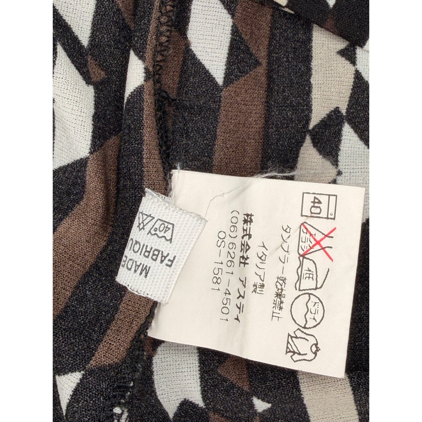 Fendi vintage 1990s T-shirt features a vertical Zucca FF logo pattern in brown, black, and white