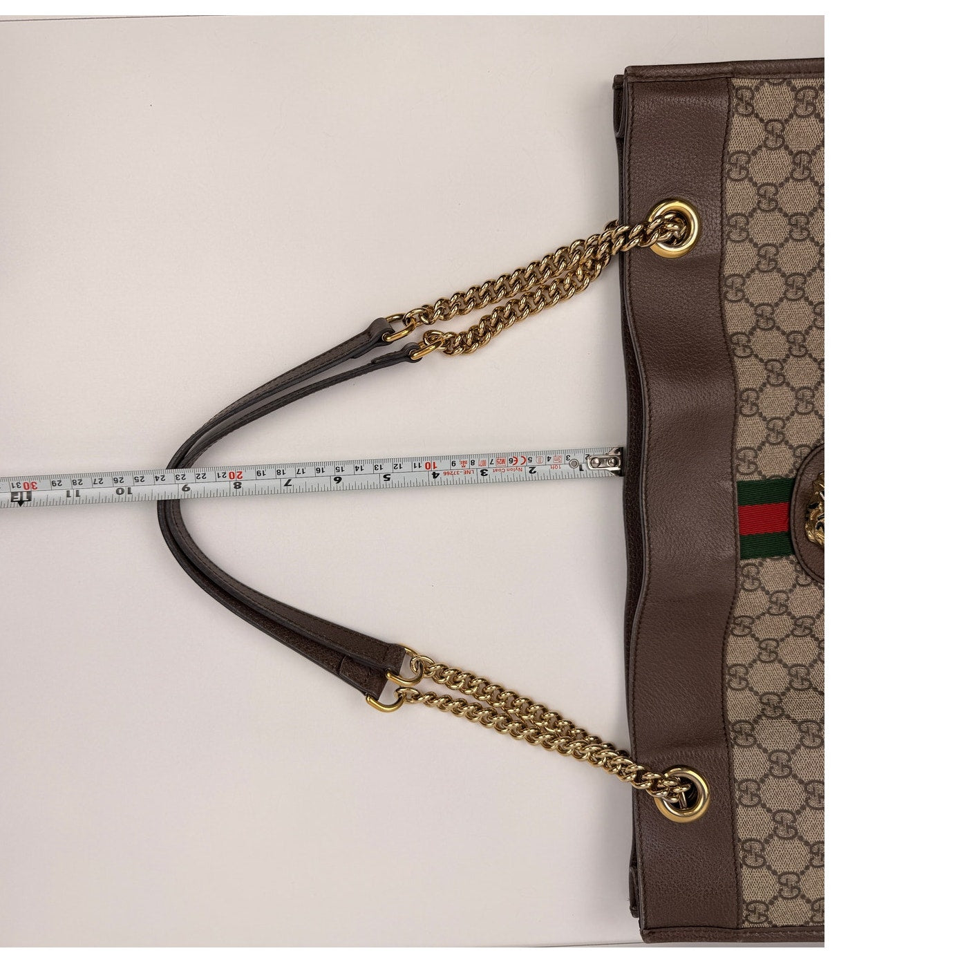Gucci Rajah Large Tote Bag in GG Supreme canvas, featuring a tiger head detail and chain straps