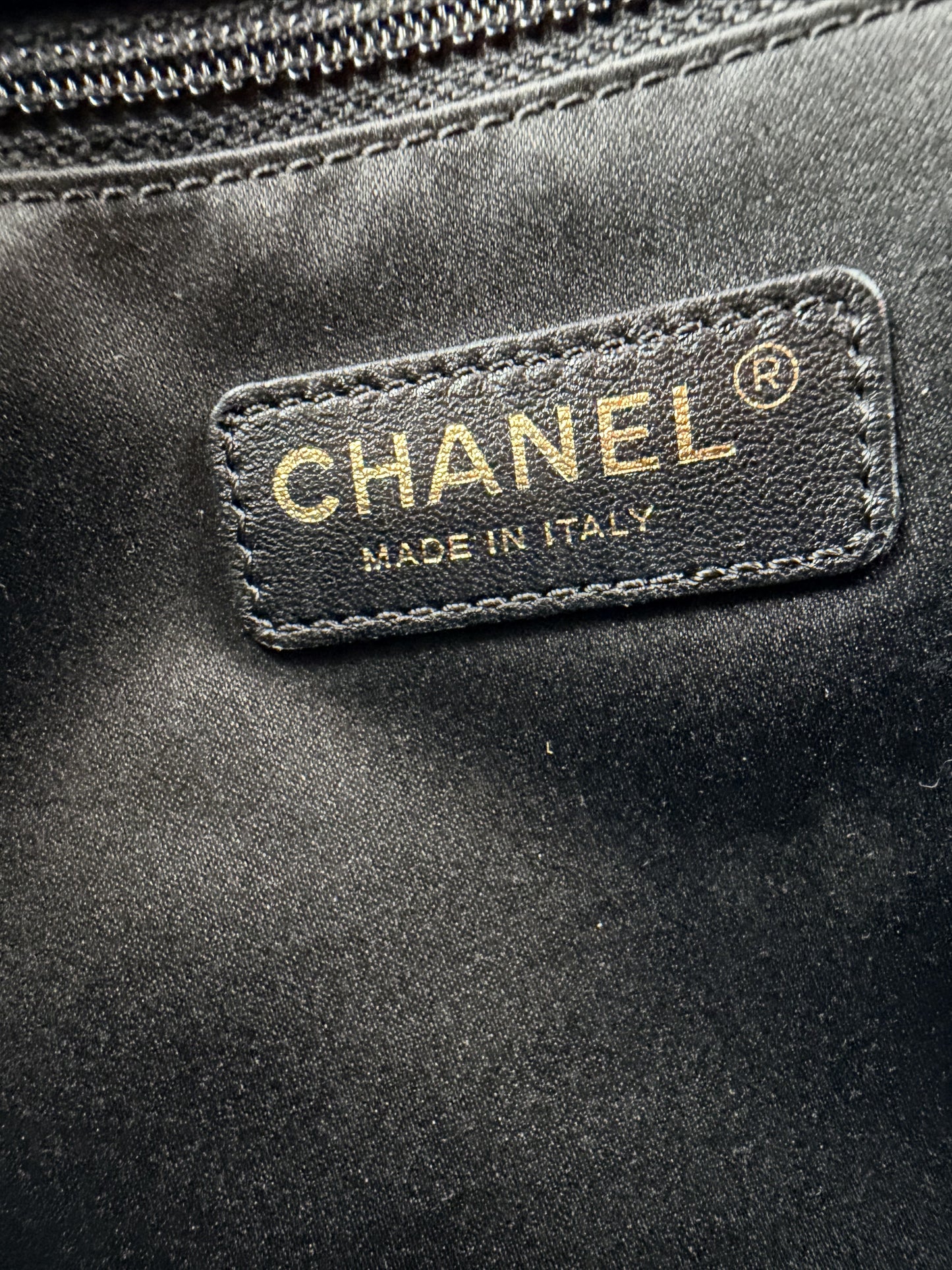 Chanel Grand Shopping Tote (GST) bag in black caviar leather with gold-tone hardware