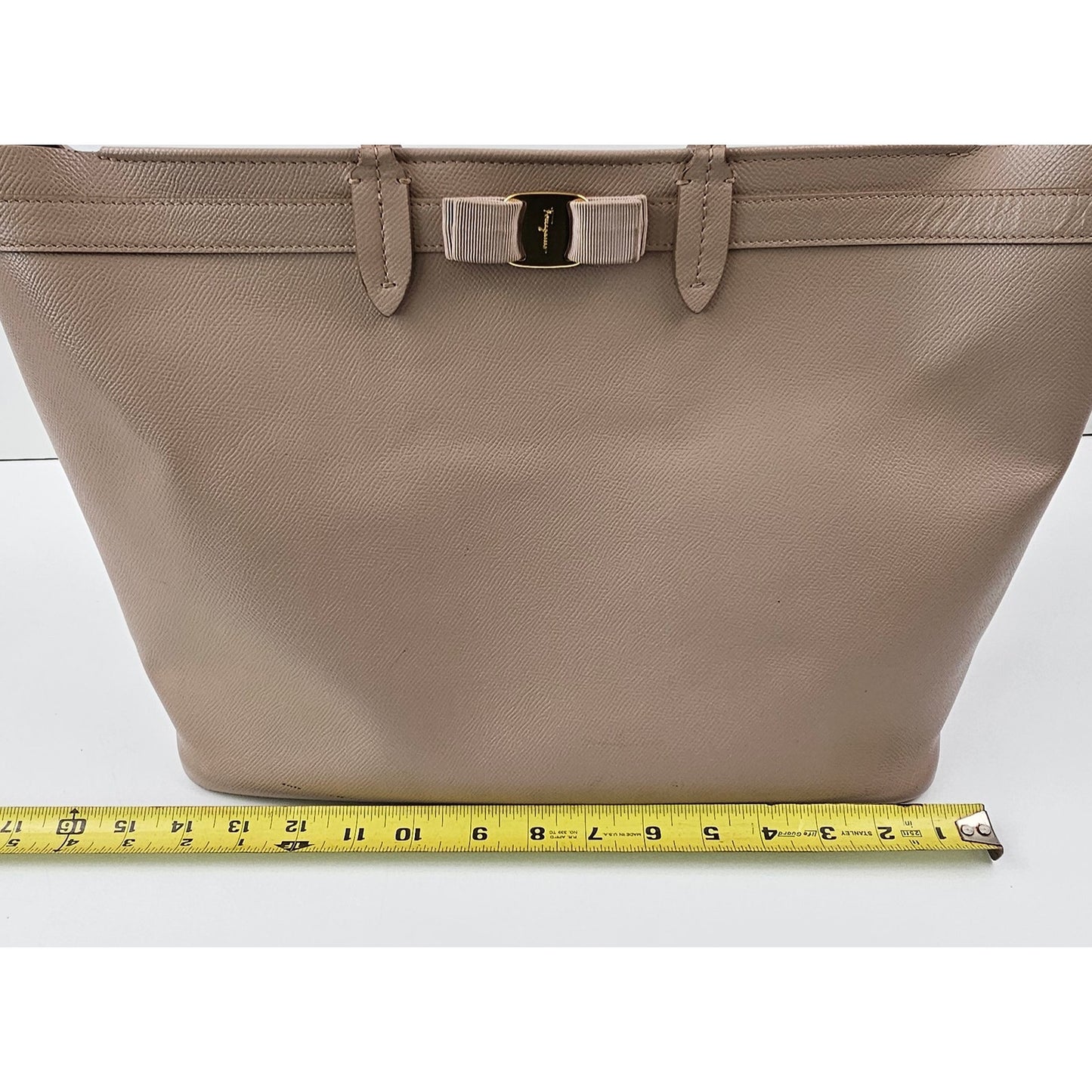 Salvatore Ferragamo Vara Bow smooth leather tote bag in a pink beige color