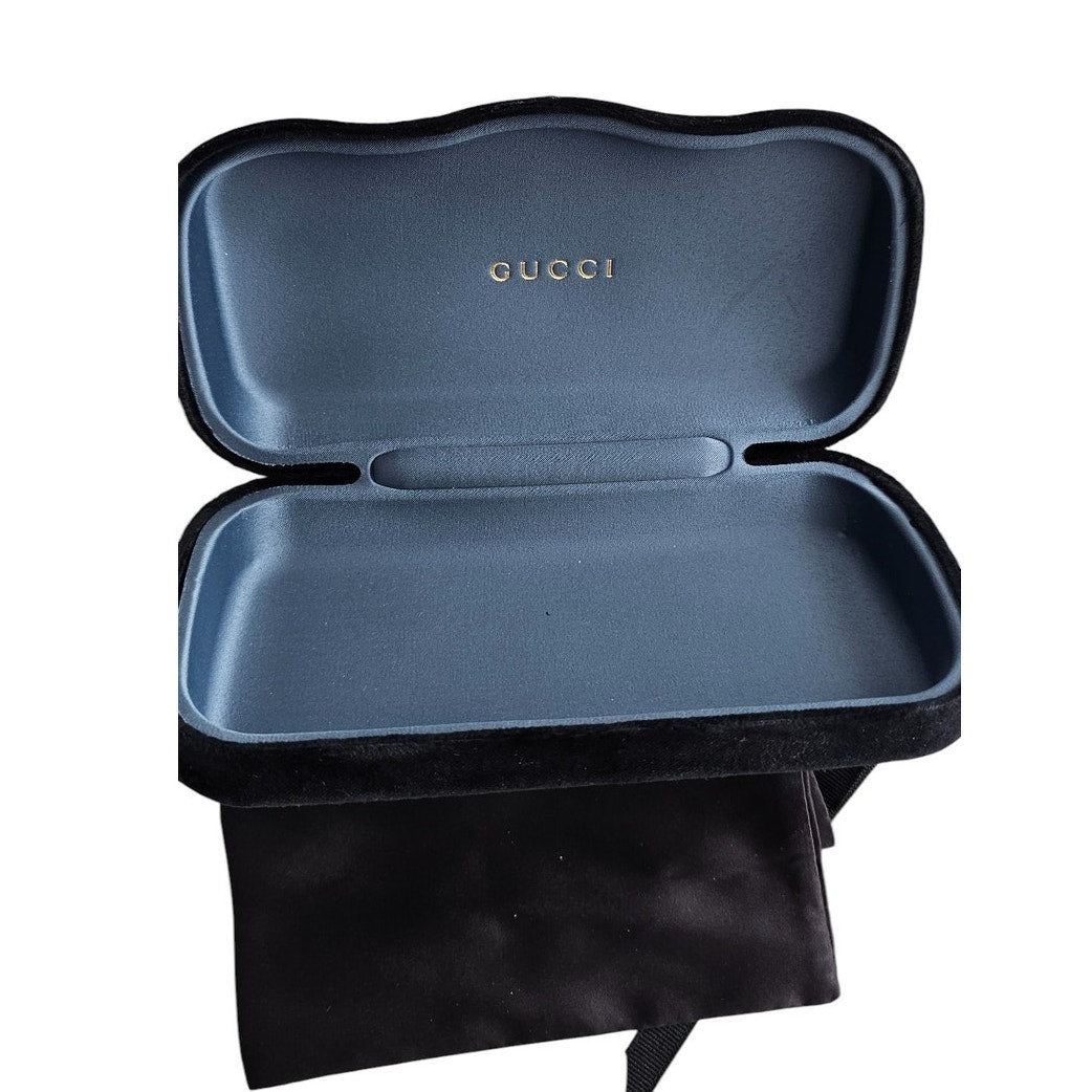 Gucci GG1423O cat-eye eyeglasses in a fuchsia havana color