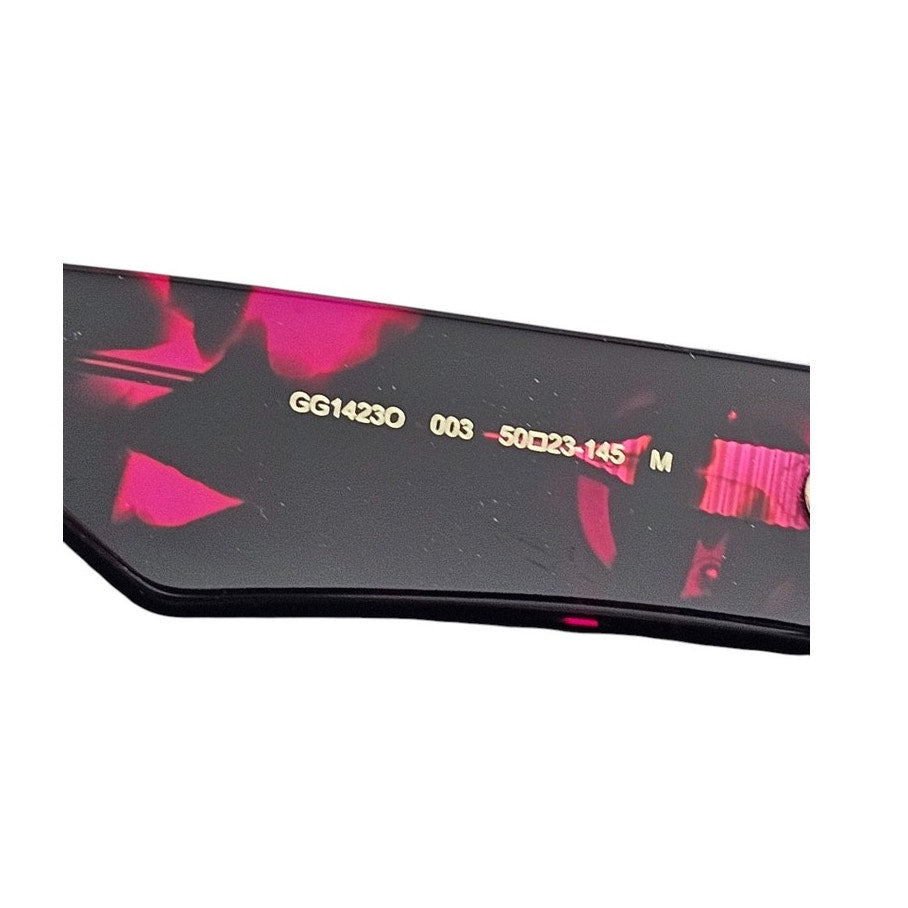 Gucci GG1423O cat-eye eyeglasses in a fuchsia havana color