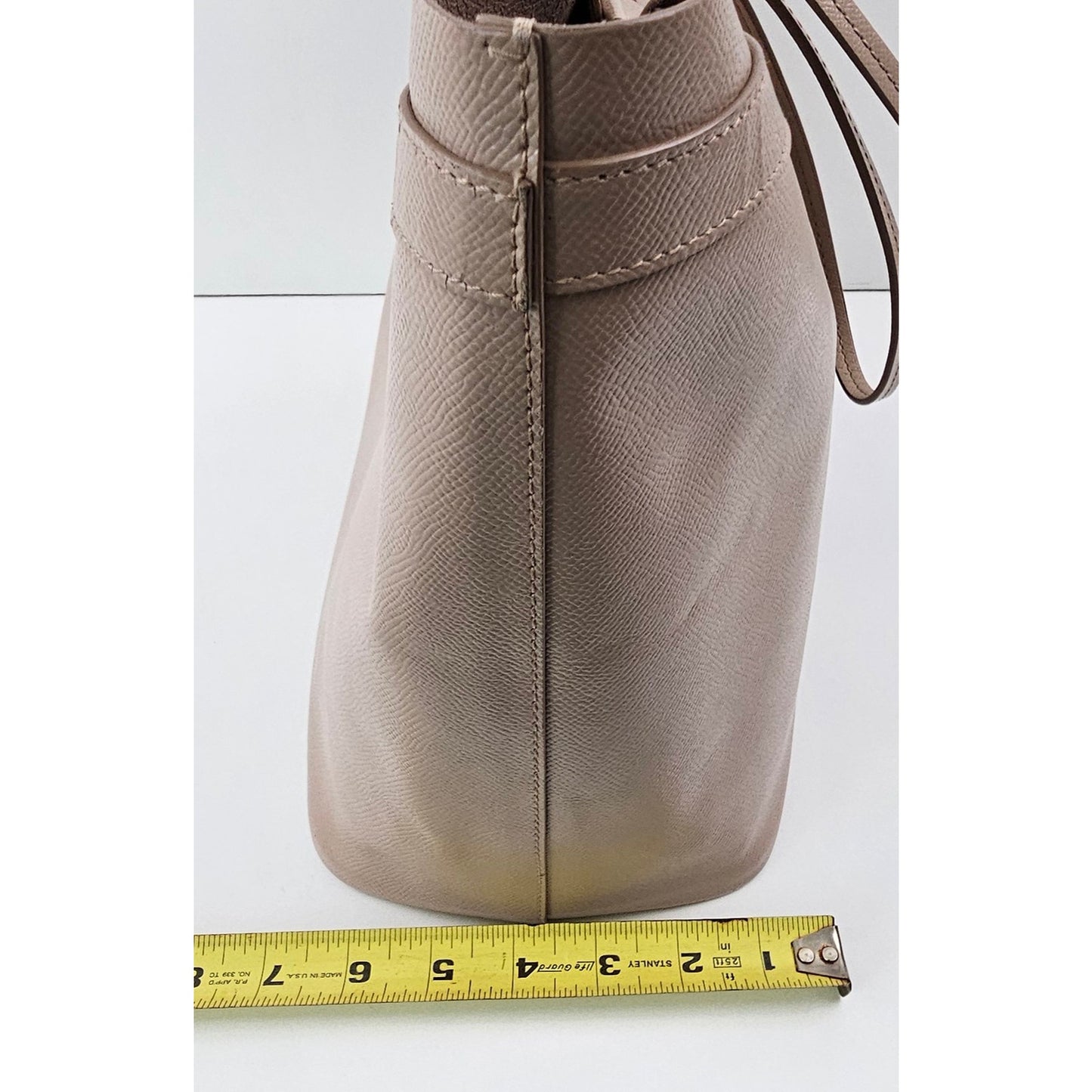 Salvatore Ferragamo Vara Bow smooth leather tote bag in a pink beige color