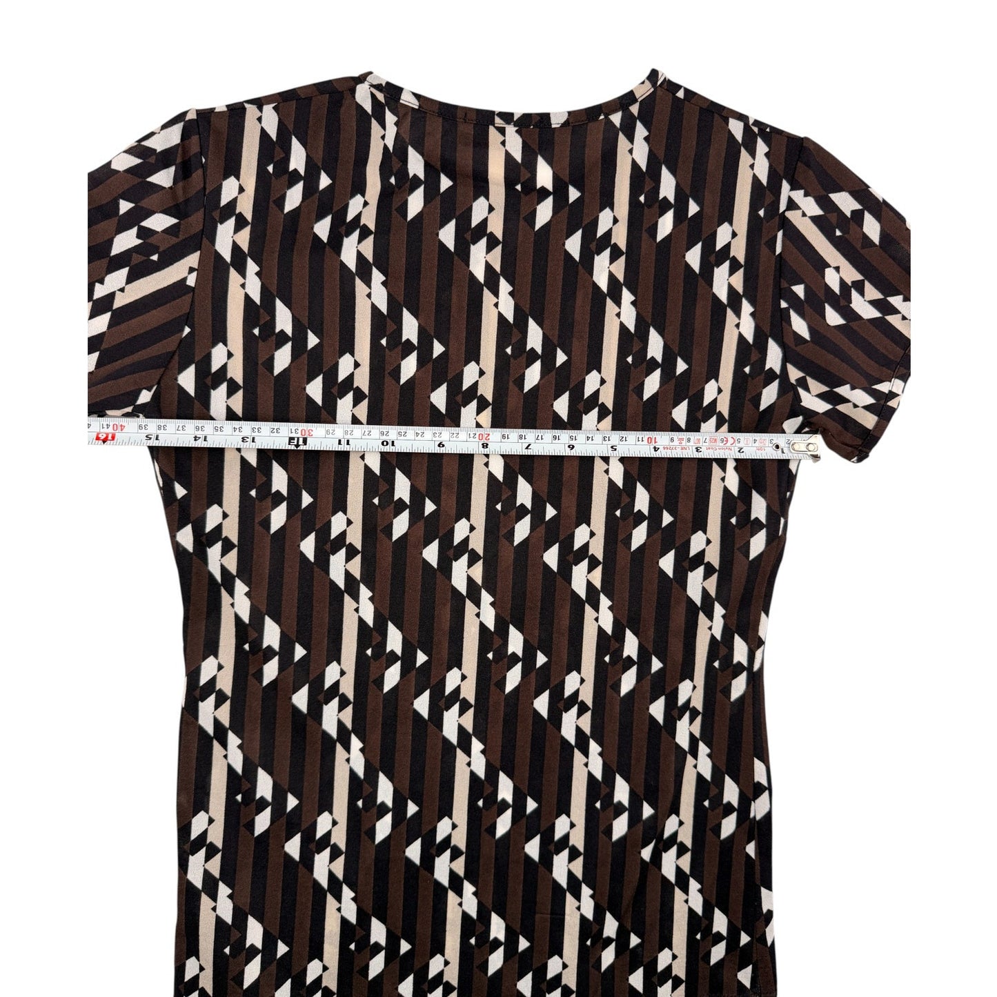 Fendi vintage 1990s T-shirt features a vertical Zucca FF logo pattern in brown, black, and white