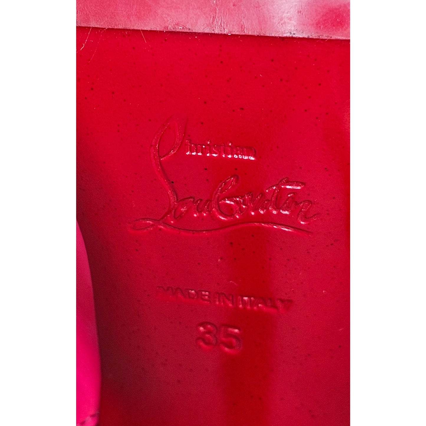 Christian Louboutin Flo slingback pump in hot pink patent leather with an orange platform and black heel