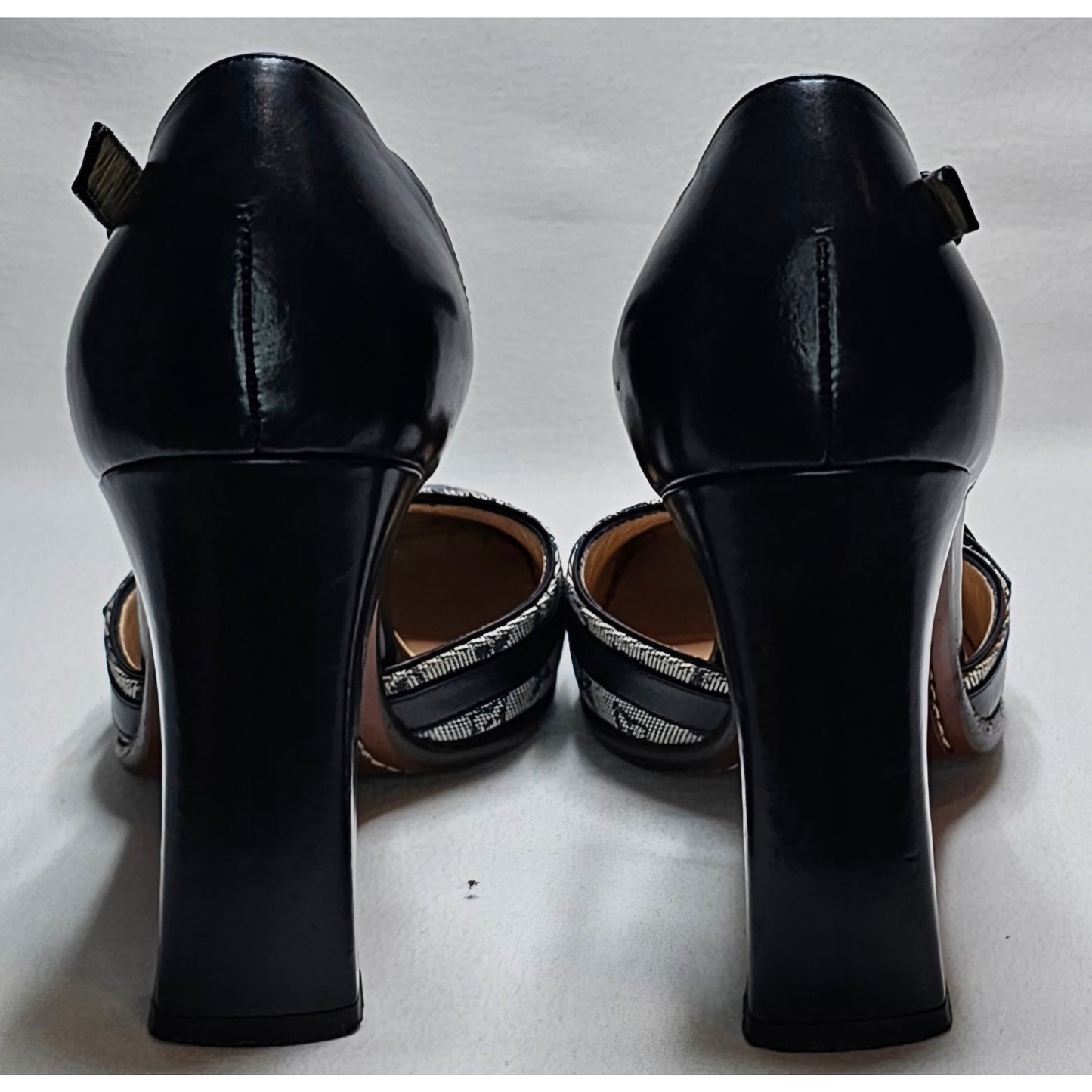 Louis Vuitton D'Orsay ankle strap pumps in blue monogram mini lin canvas and black leather.