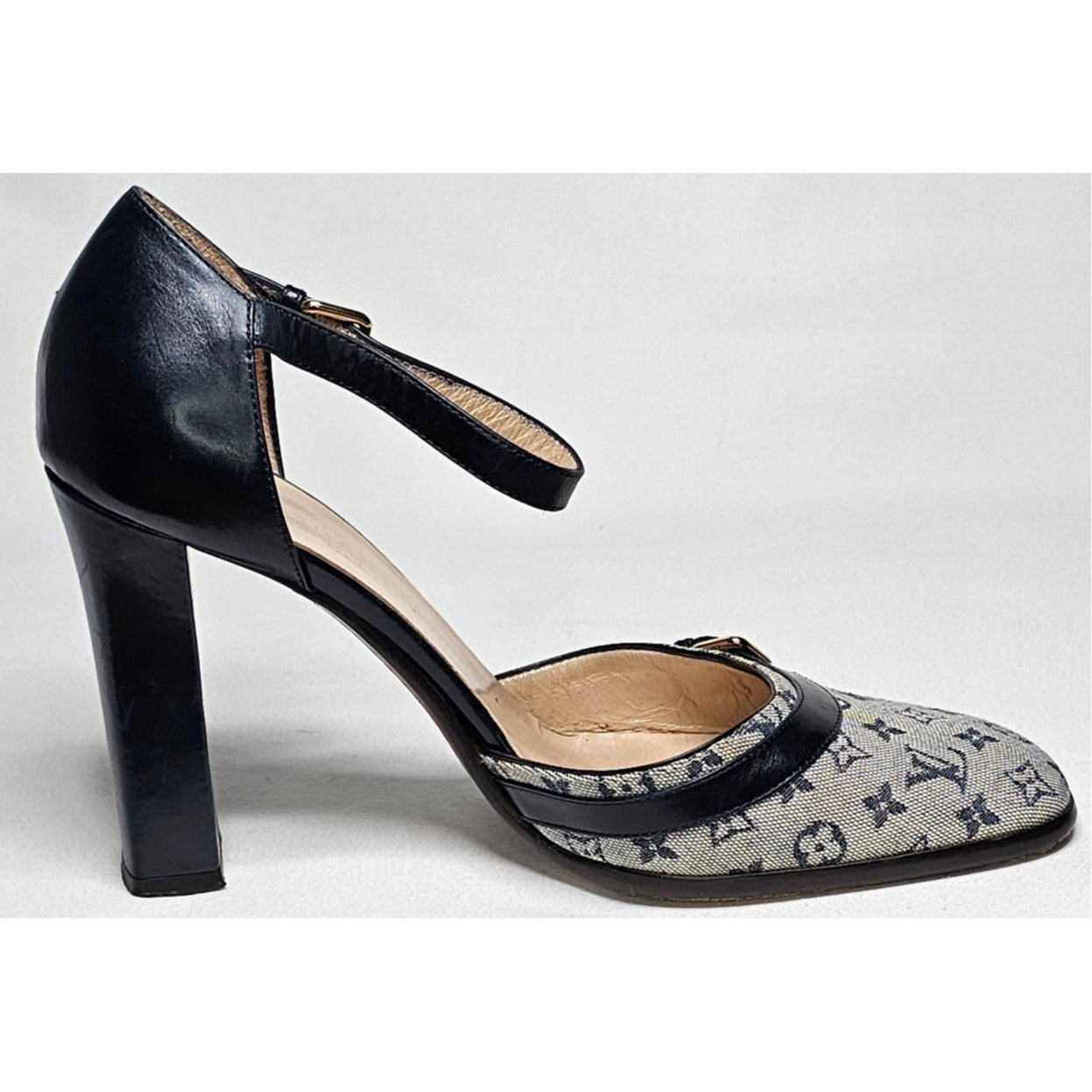 Louis Vuitton D'Orsay ankle strap pumps in blue monogram mini lin canvas and black leather.