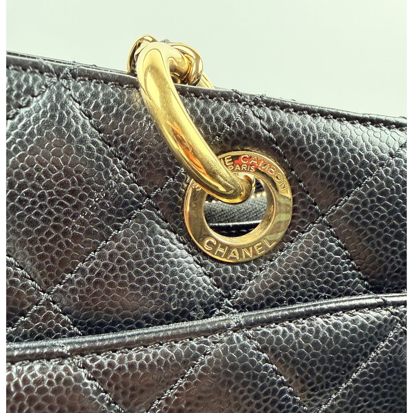 Chanel Grand Shopping Tote (GST) bag in black caviar leather with gold-tone hardware
