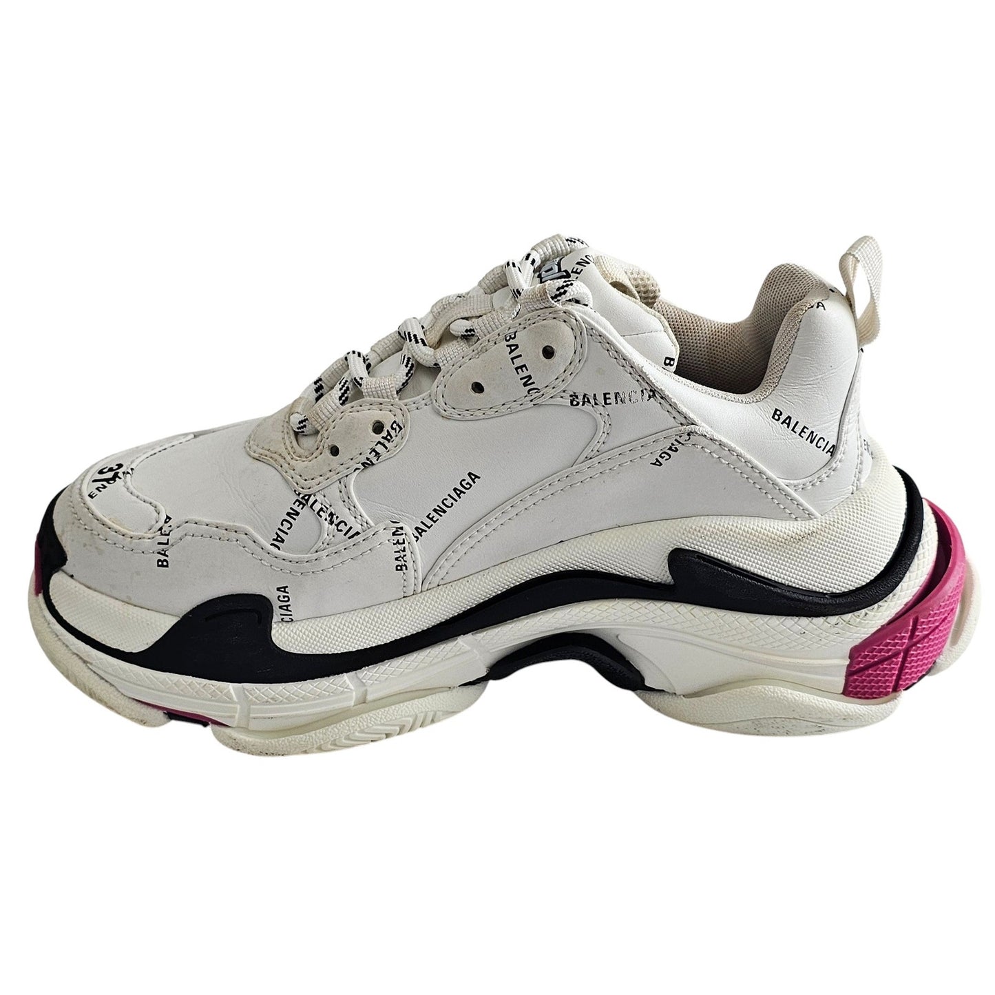 Balenciaga Triple S sneakers in white and black with pink accents and all-over logo detailing