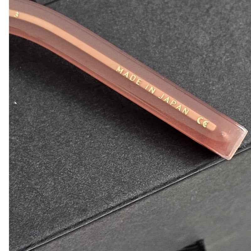 Valentino Garavani V-Soul butterfly sunglasses in powder pink Japanese acetate with gradient lenses and rose gold titanium details