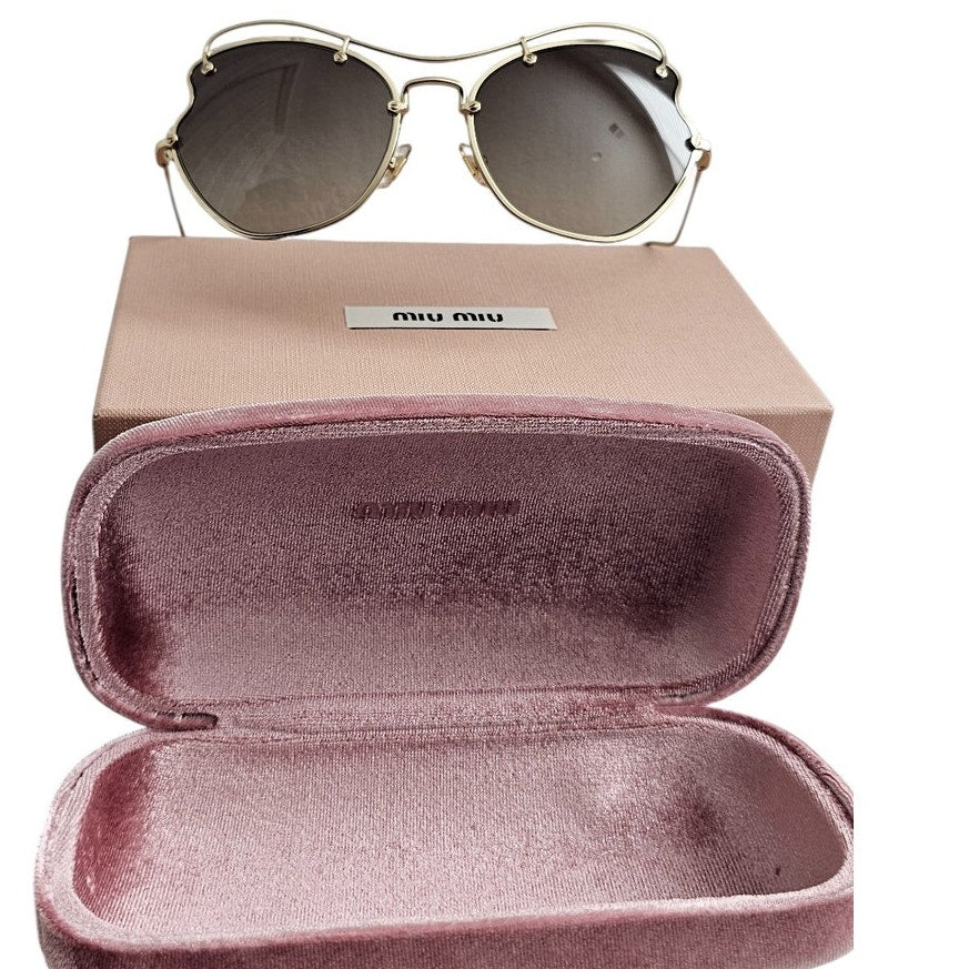 Miu Miu butterfly-style women's sunglasses with a pale gold-tone metal frame