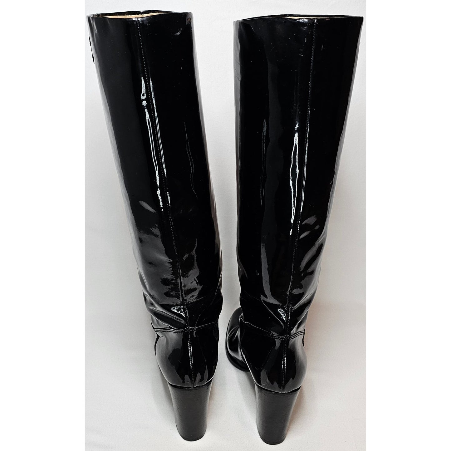 Chanel black patent leather boots with a chunky heel and embroidered CC logo