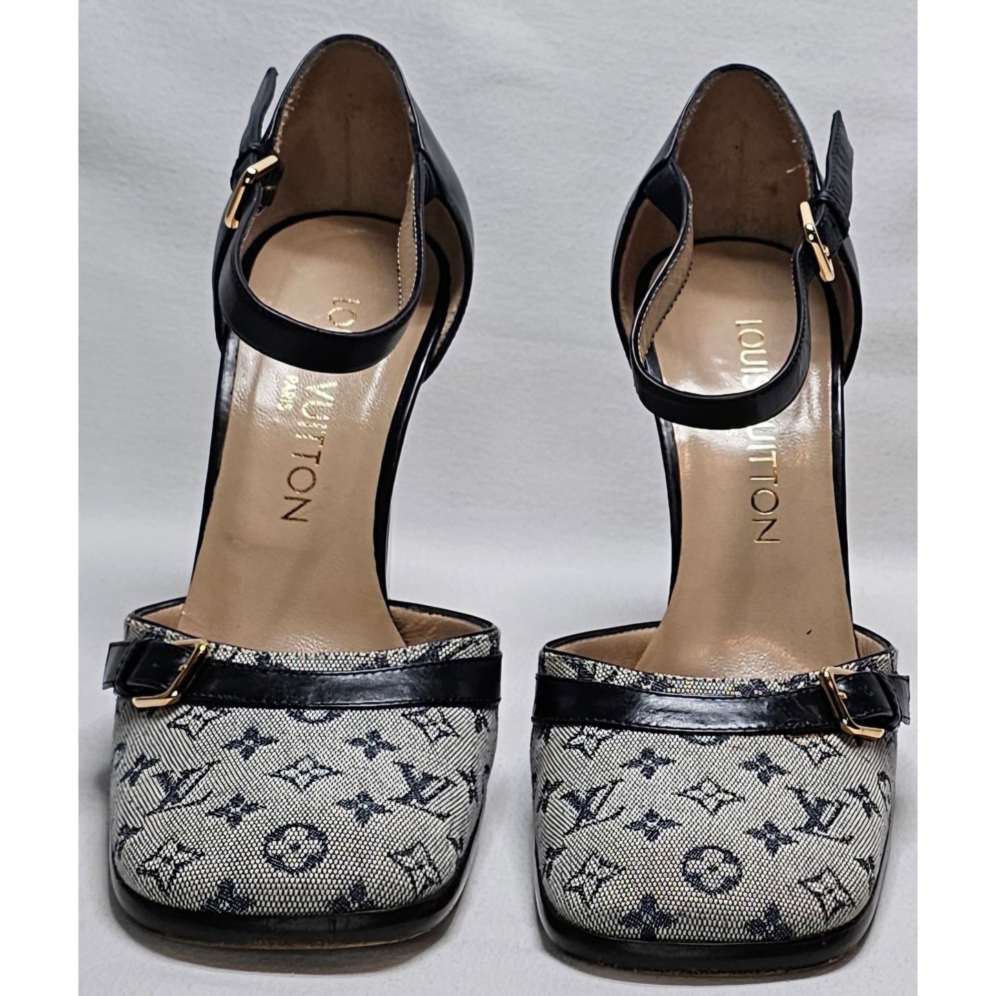 Louis Vuitton D'Orsay ankle strap pumps in blue monogram mini lin canvas and black leather.