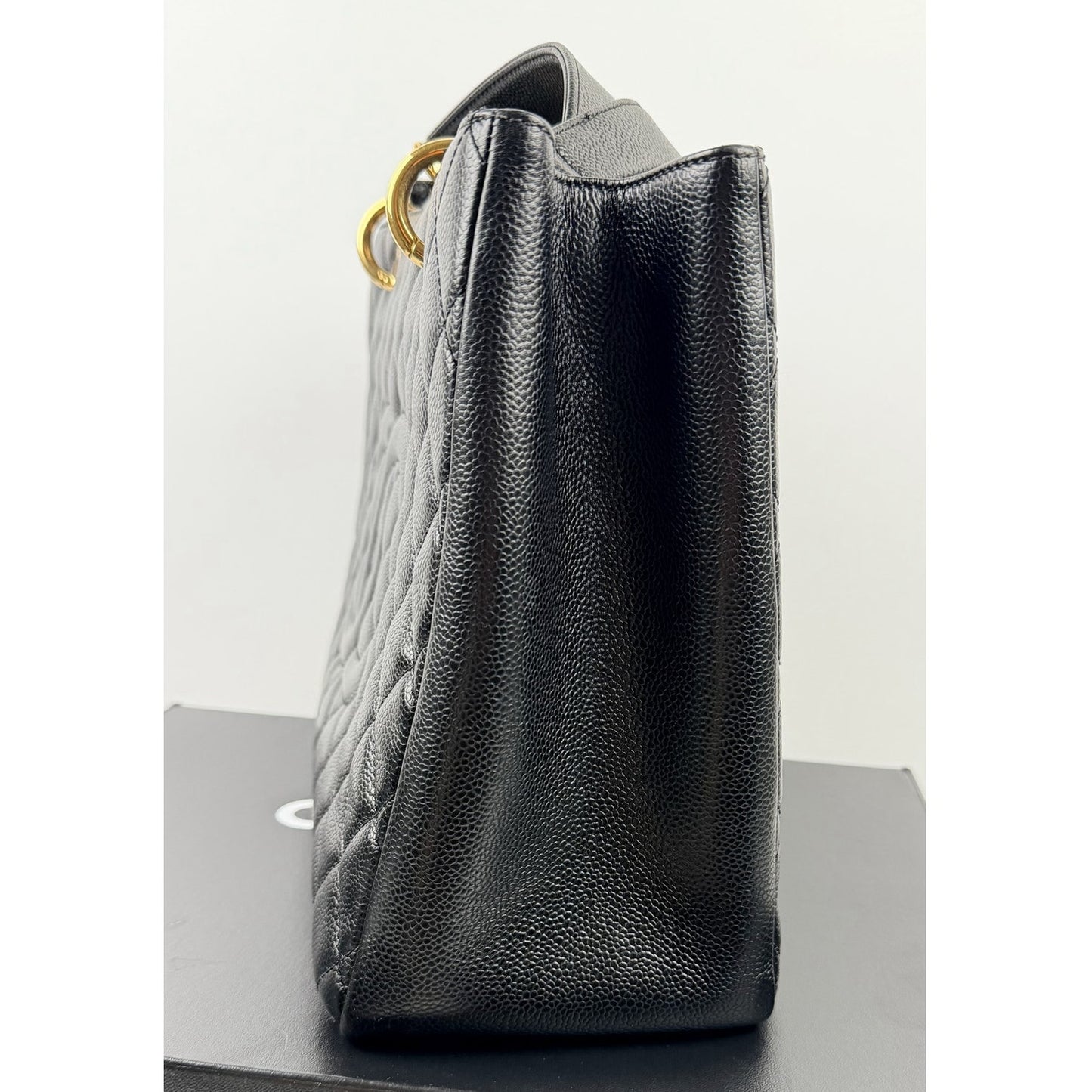 Chanel Grand Shopping Tote (GST) bag in black caviar leather with gold-tone hardware