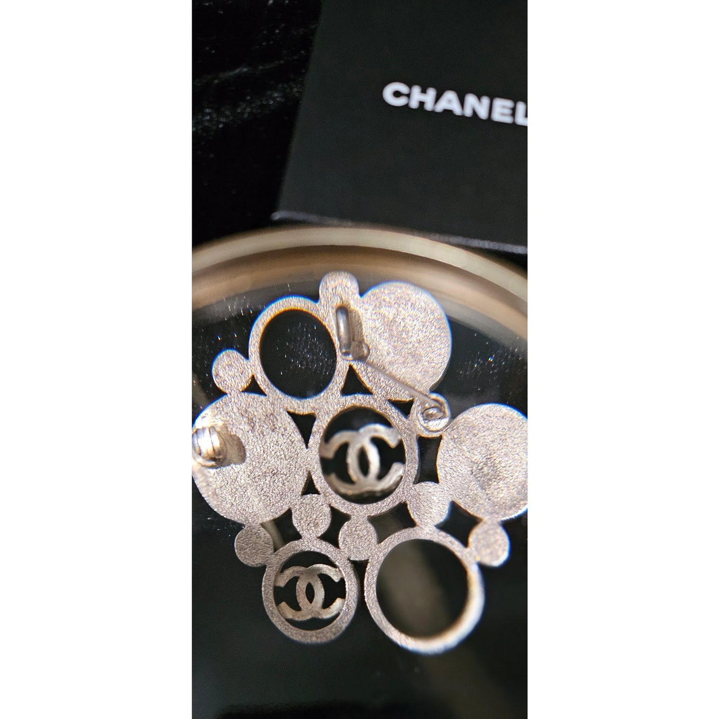 Vintage Chanel Metal Brooch with White Enamel CC Logos and Circular Detail
