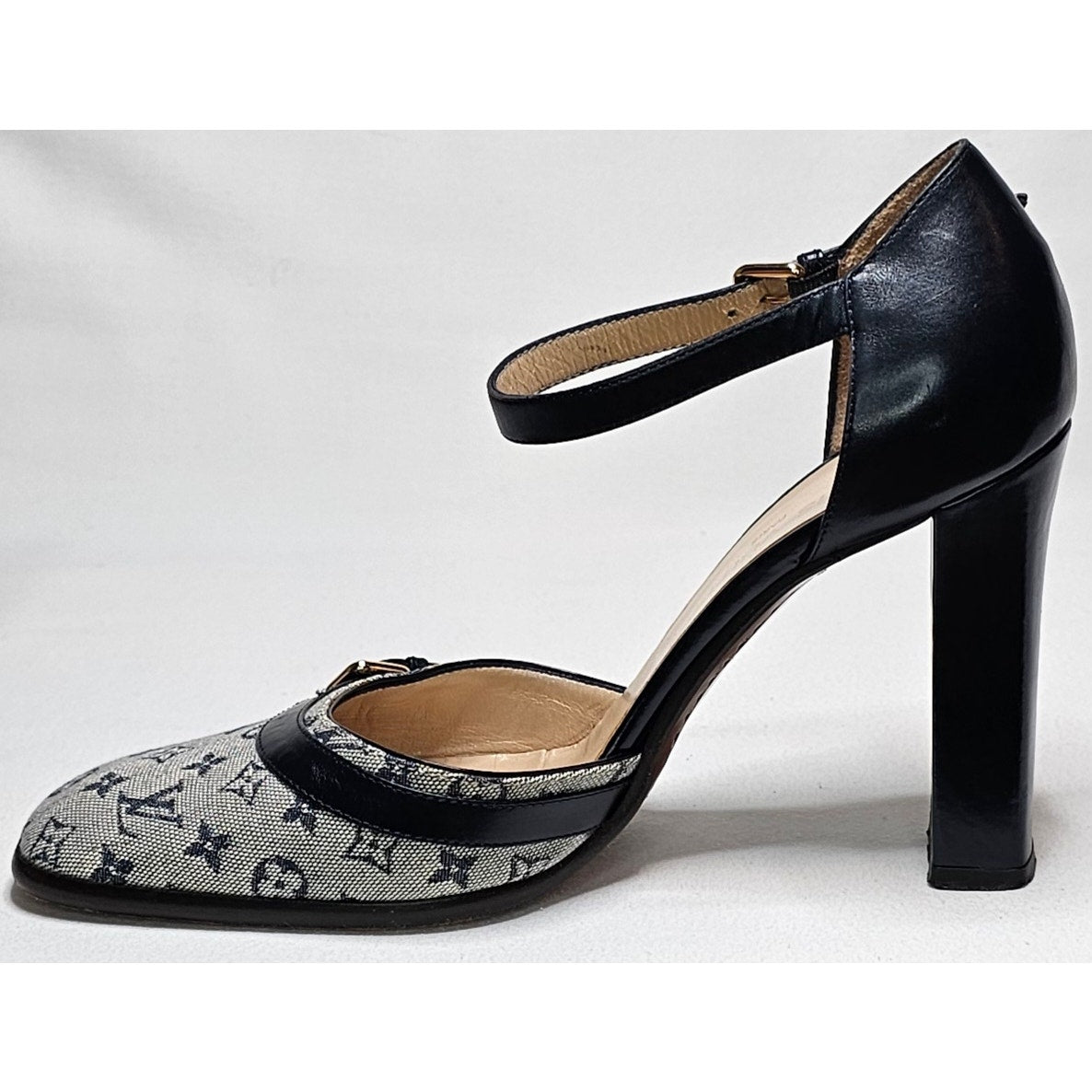 Louis Vuitton D'Orsay ankle strap pumps in blue monogram mini lin canvas and black leather.