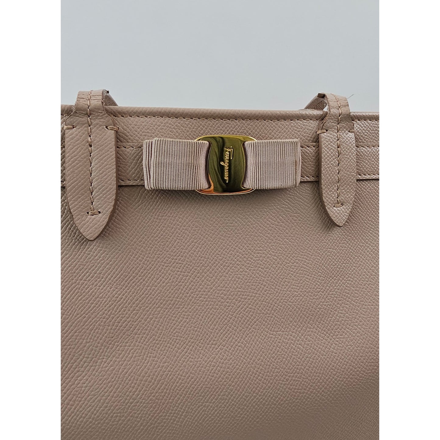 Salvatore Ferragamo Vara Bow smooth leather tote bag in a pink beige color